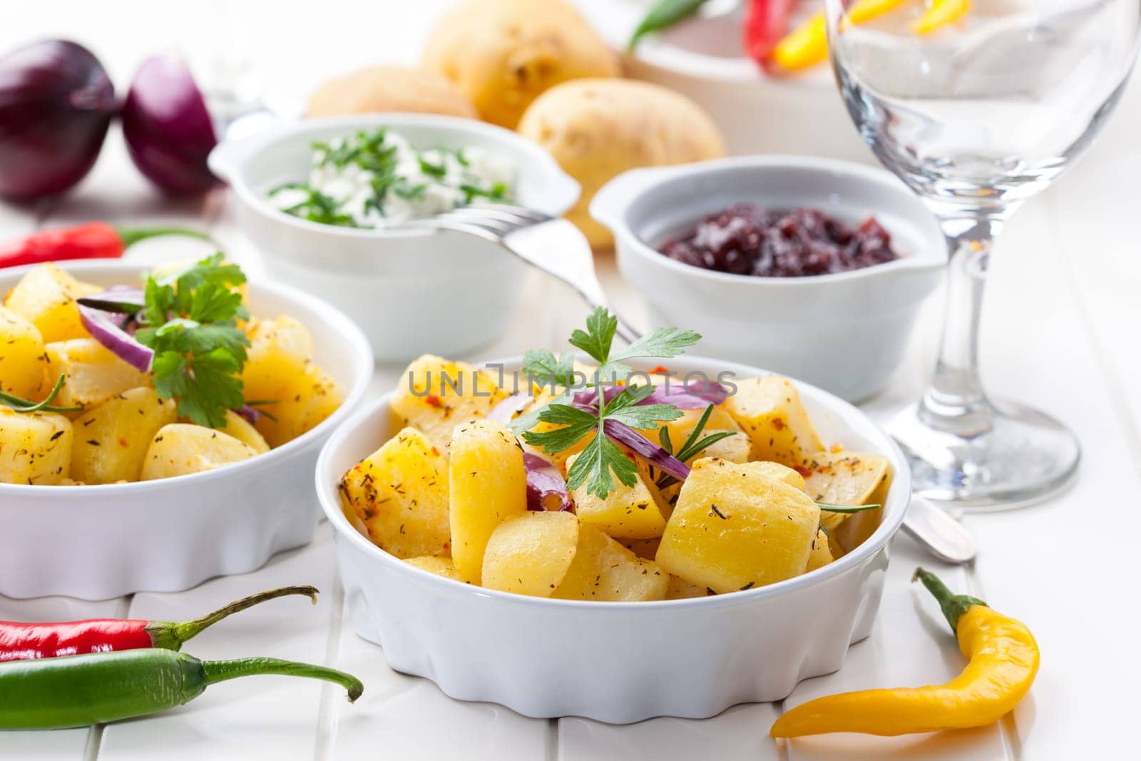 Baked potatoes with chutney and sour cream