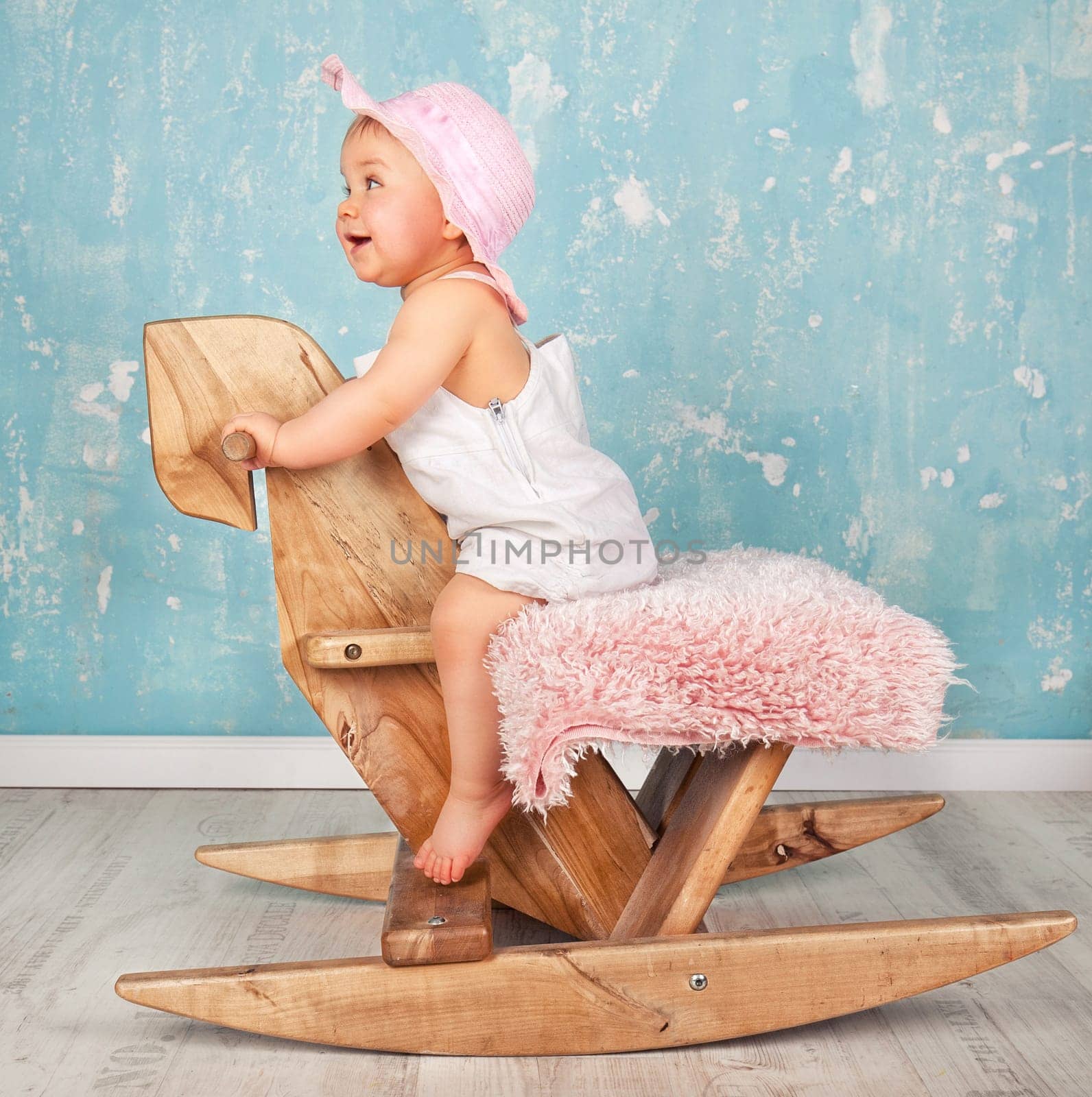 Toddler on rocking horse