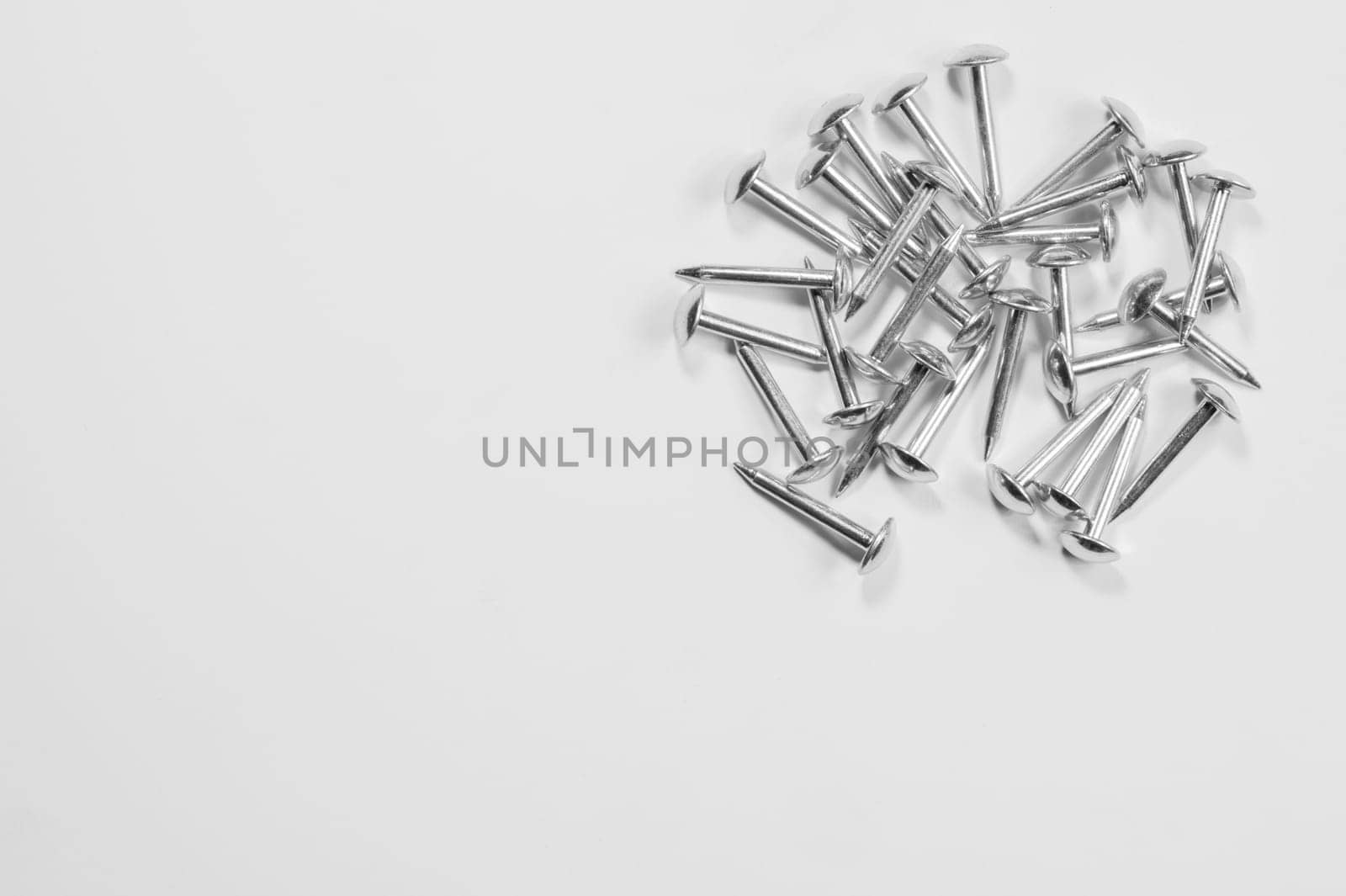 Metal nails isolated on white background