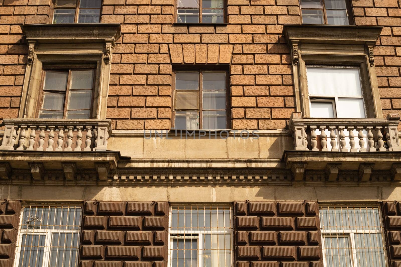 Brown brick wall with decorated windows background