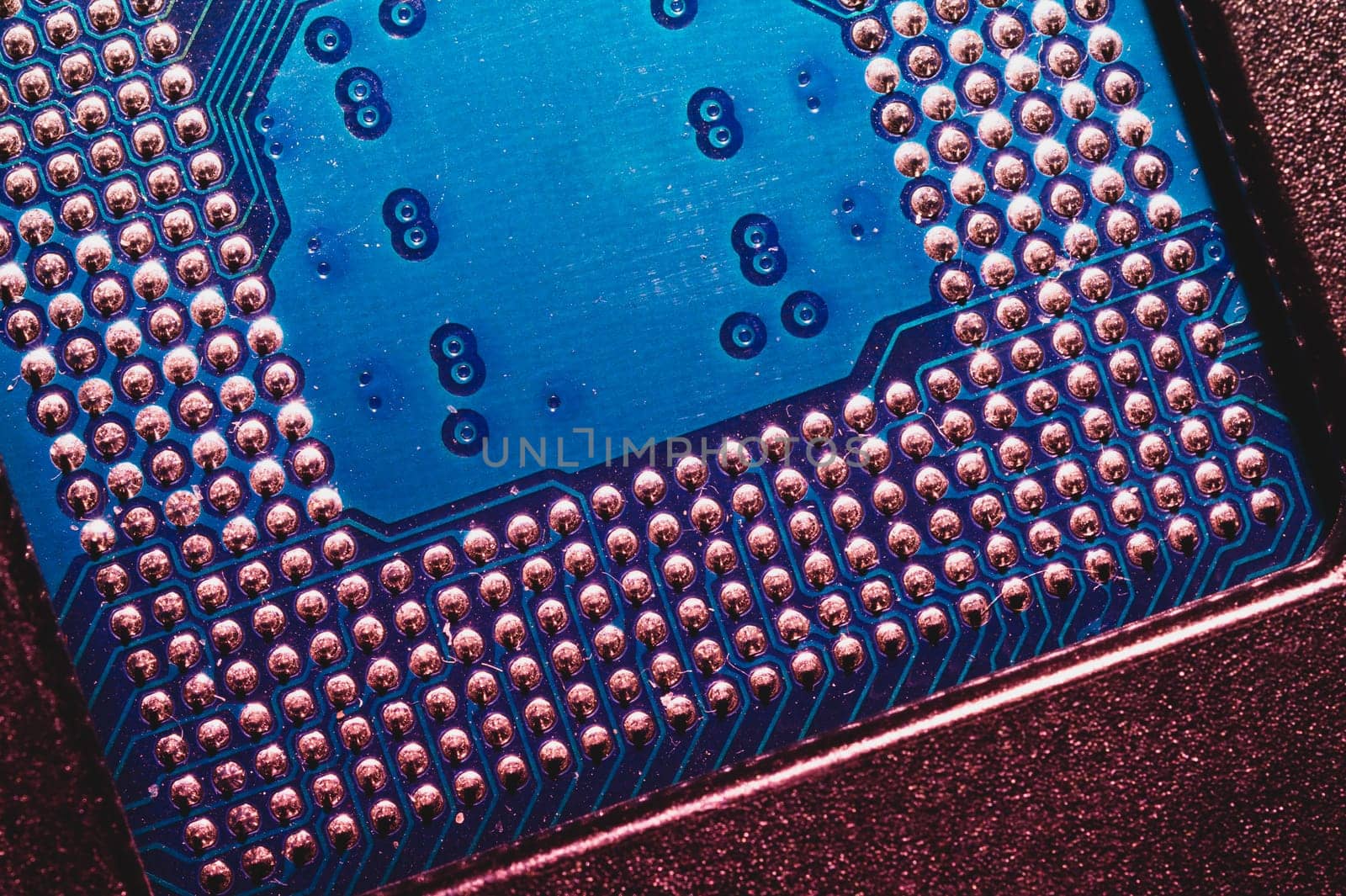 Processor pins macro. computer motherboard close up. cpu pins on a circuit board. micro elements of computer central processor unit. modern technologies abstract background