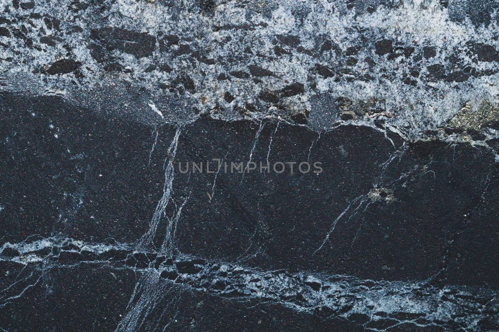 Carbon stone gray texture. flat scratched surface. geological background