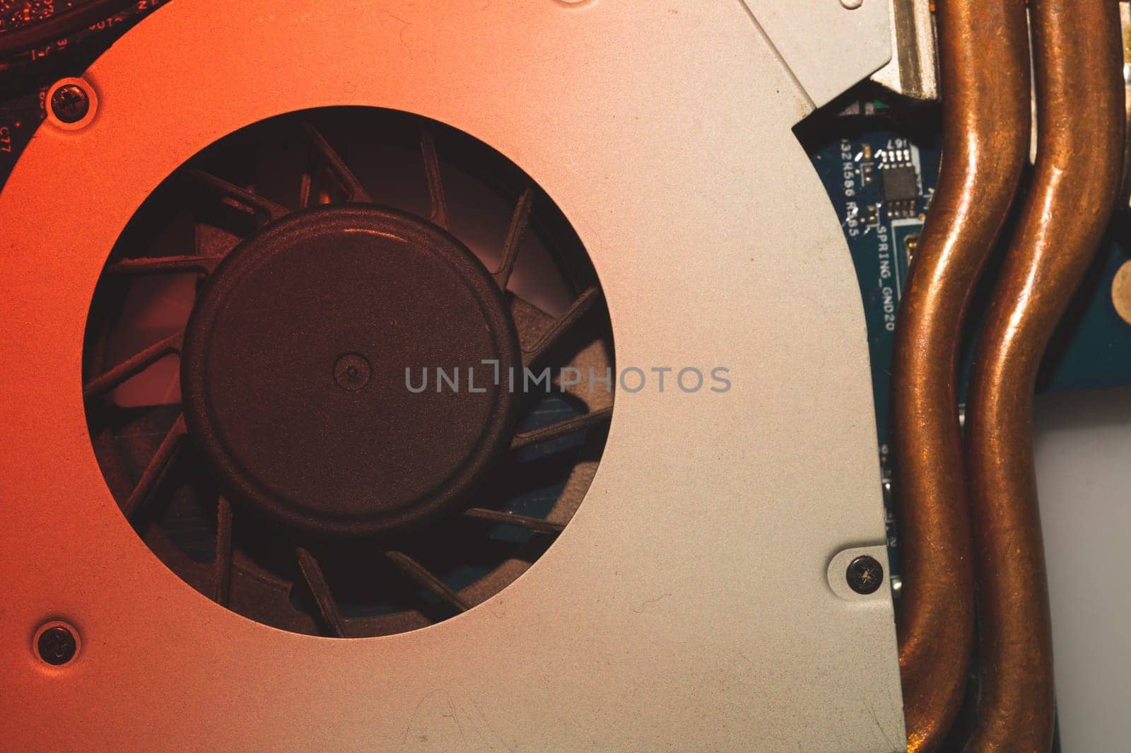 Cooling system of notebook close up. computer cooling fan with dust. computer technology background