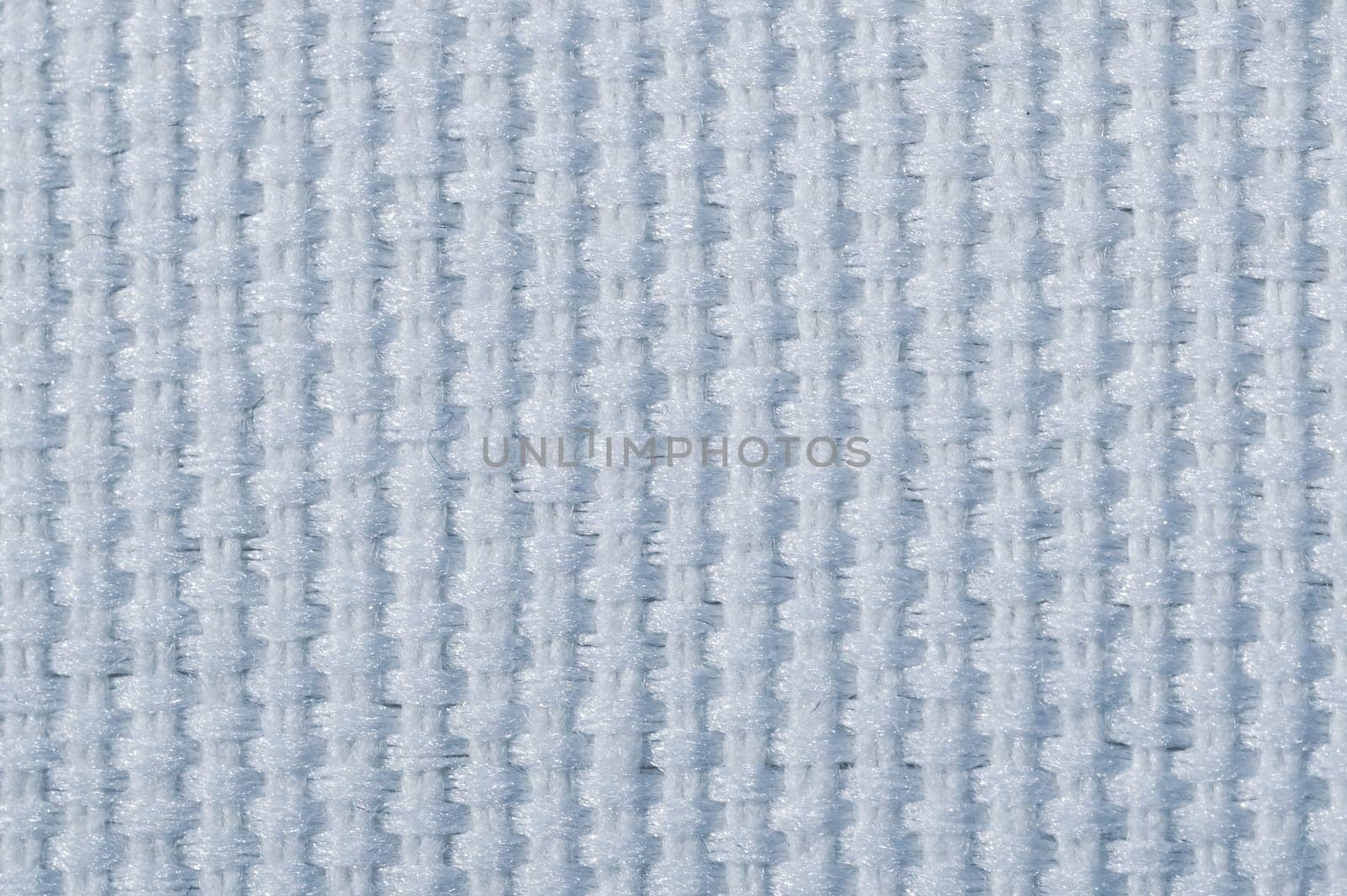 Knitted fabric macro. woven material background. textile texture close up