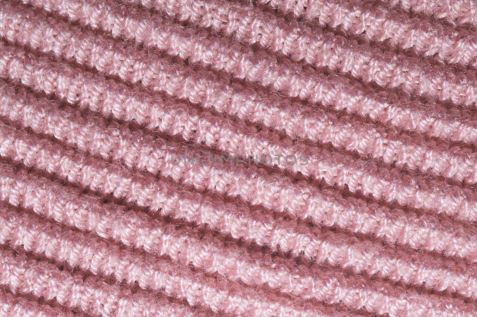 Knitted wool texture. woven material. fabric close up background