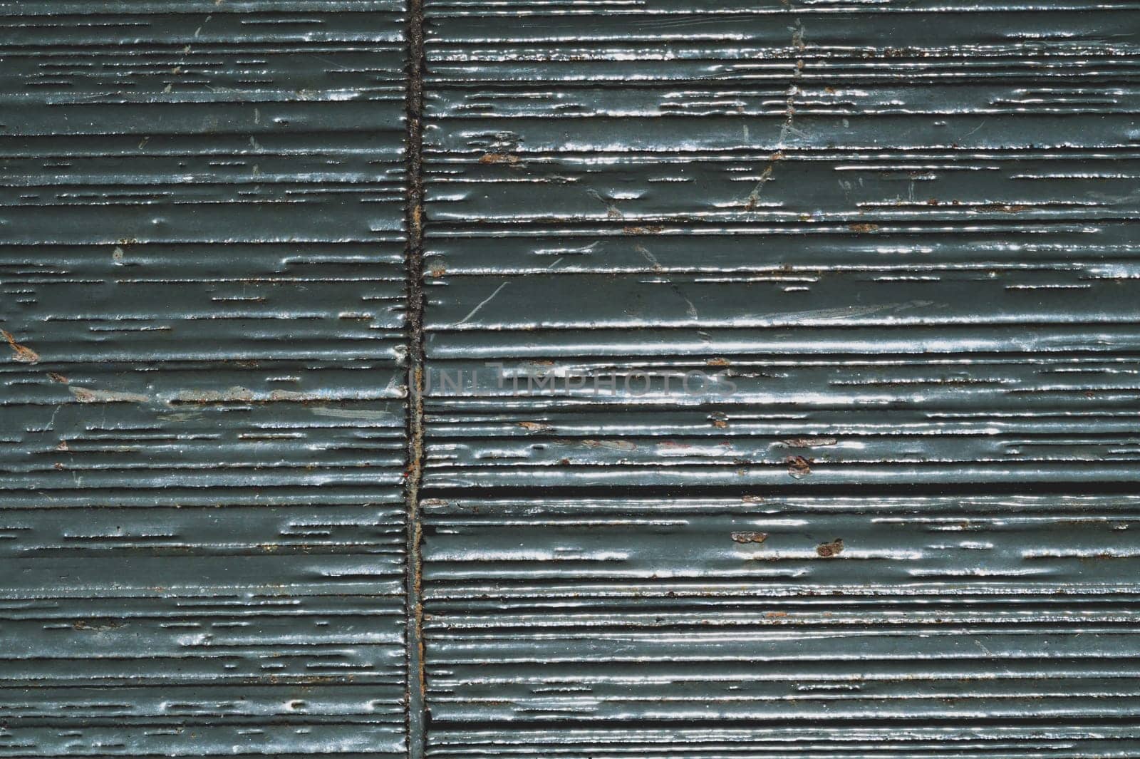 Industrial surface with cracks and scratches. metal plate coated with paint. grunge texture