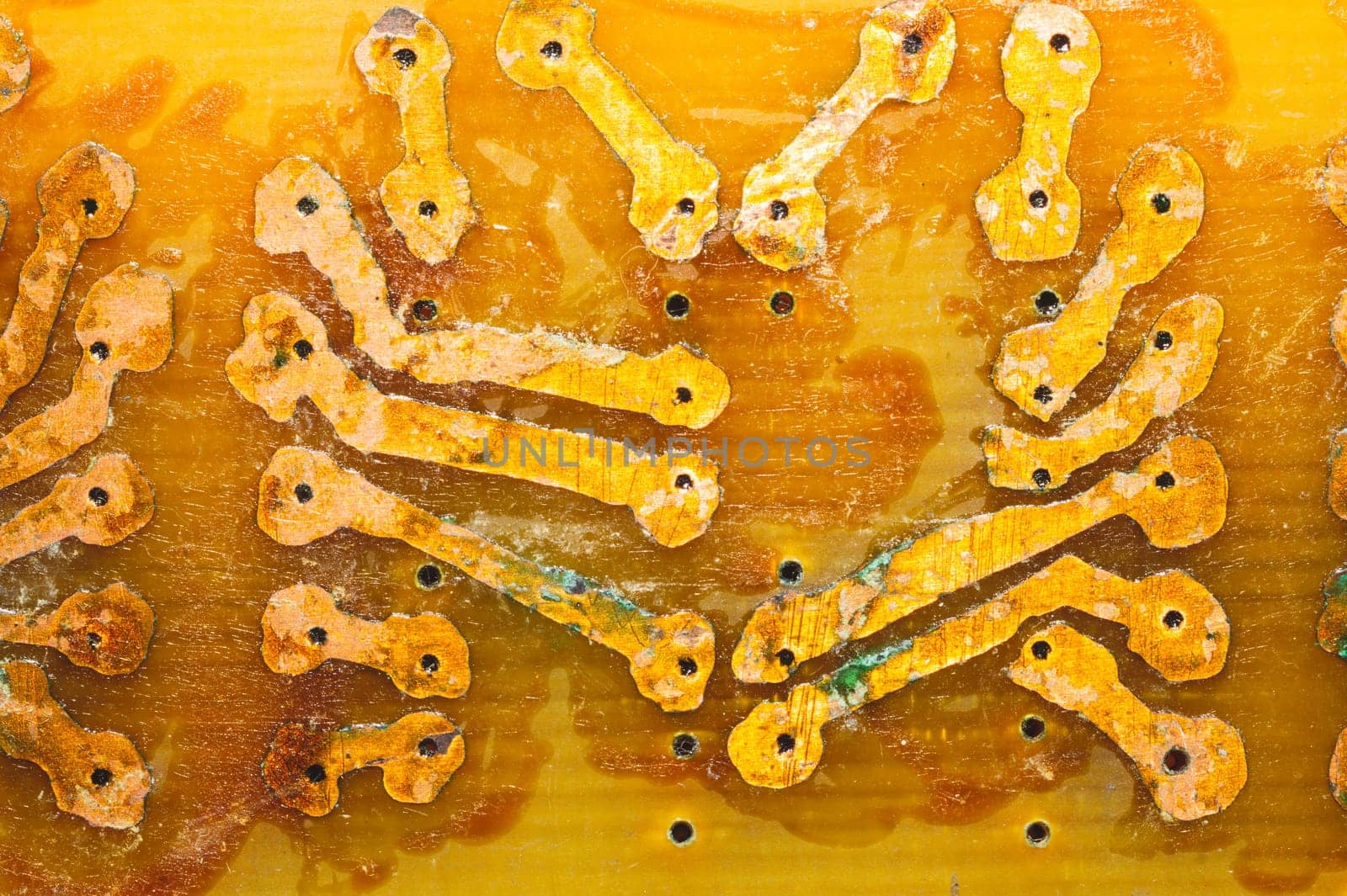 Handmade circuit board with copper tracks. industrial background. radio engineering background. textolite with soldering