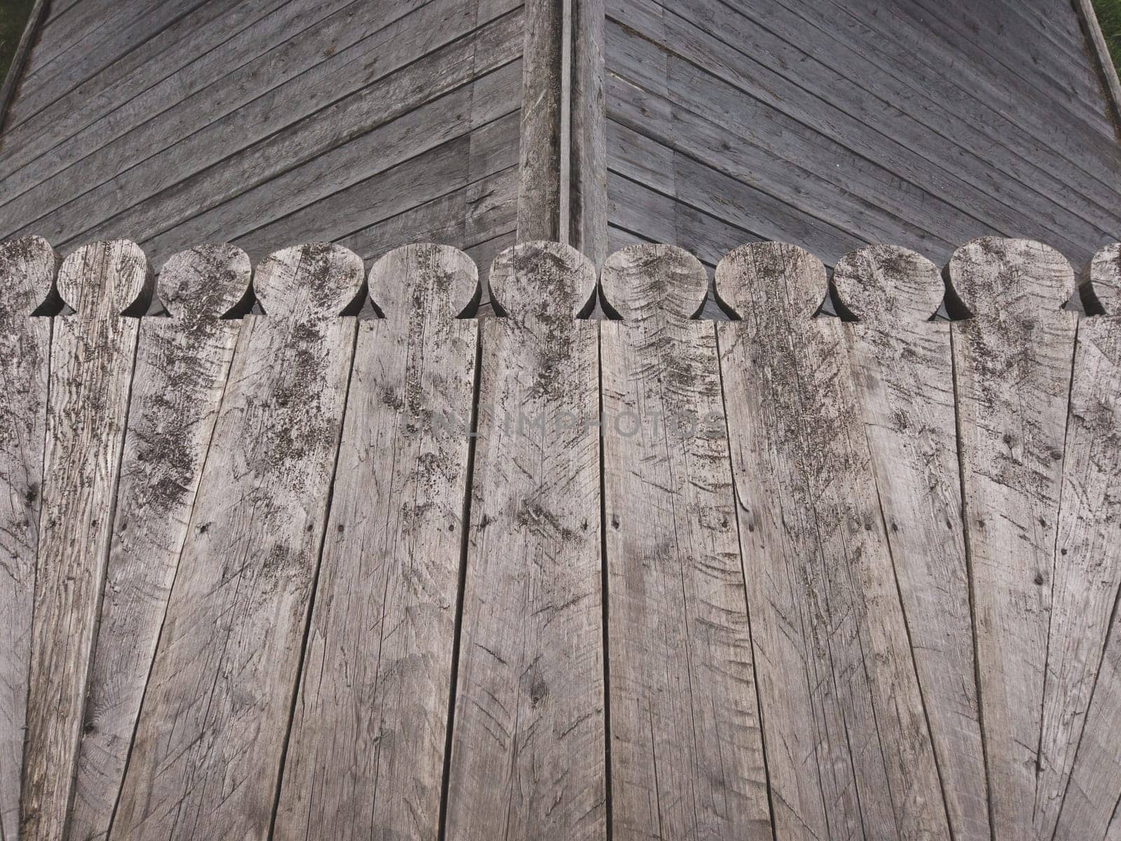 Carved wooden planks background. detail of the traditional roof of a village house
