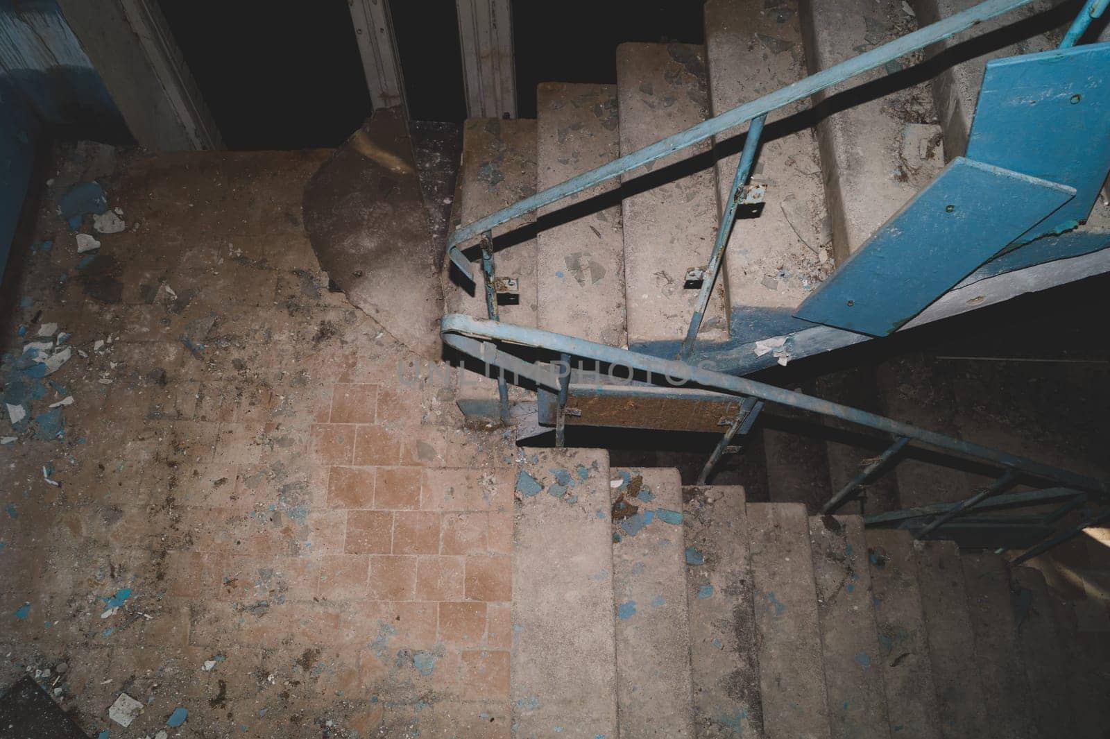 Staircase in an abandoned building. destroyed house