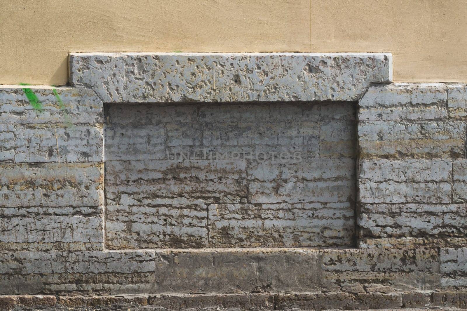 Rough wall of ancient house. uneven surface