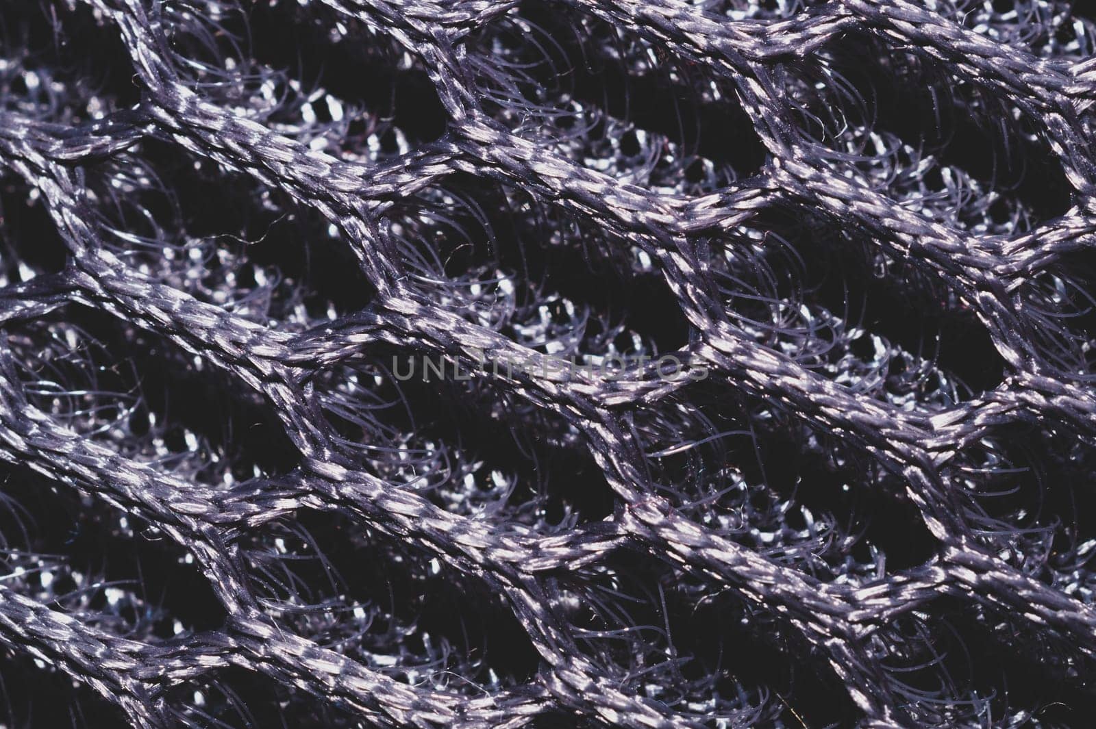 Gray fabric texture close up. textile background. knitted pattern. woven material