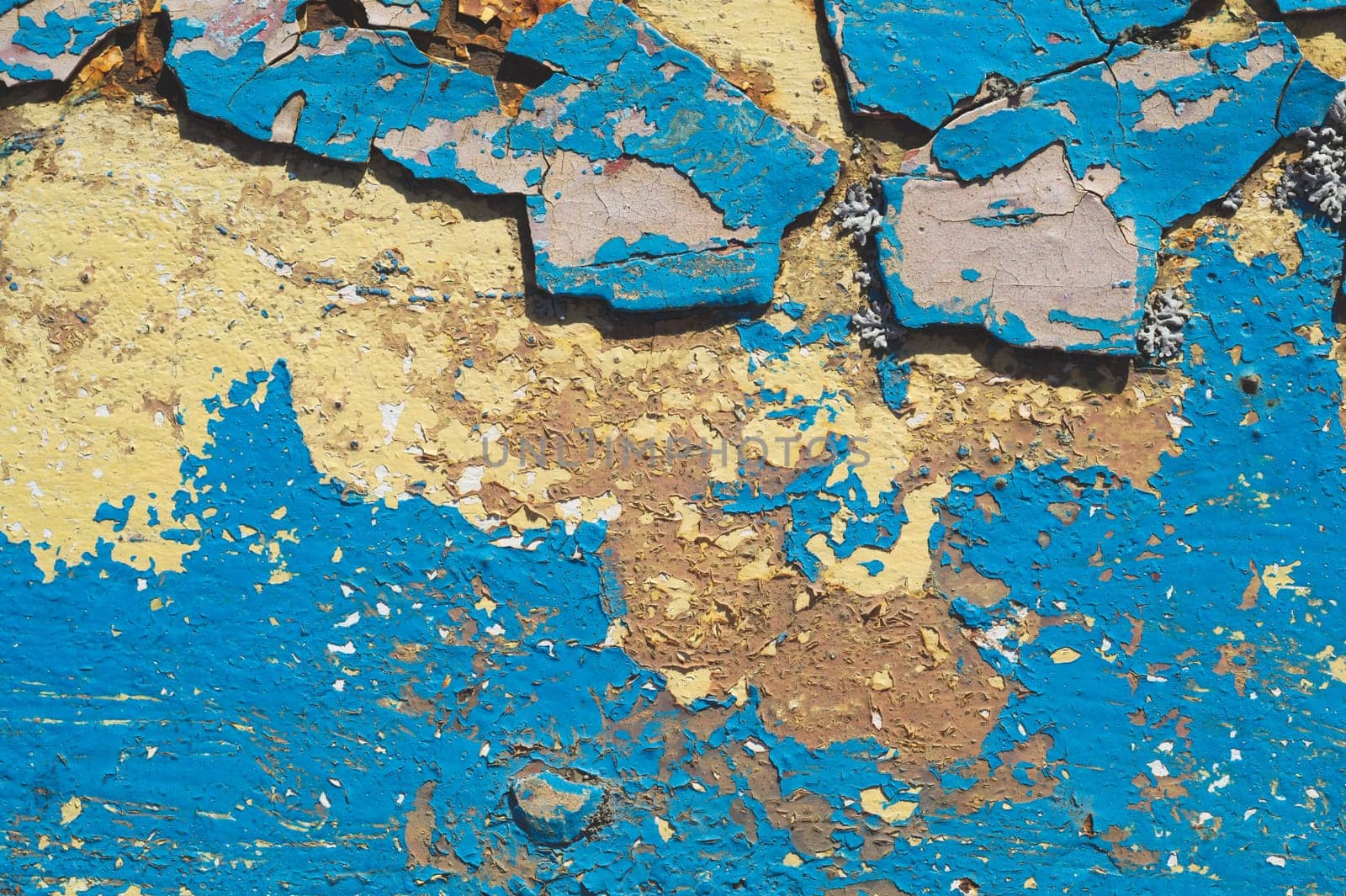 Shabby paint on the old surface. abstract industrial background. grunge texture