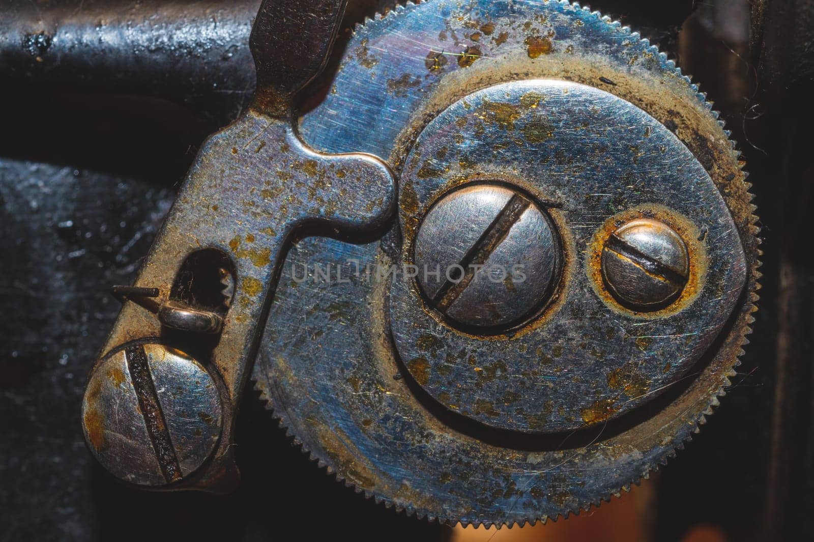 Detail of old sewing machine close up. rusted mechanism macro