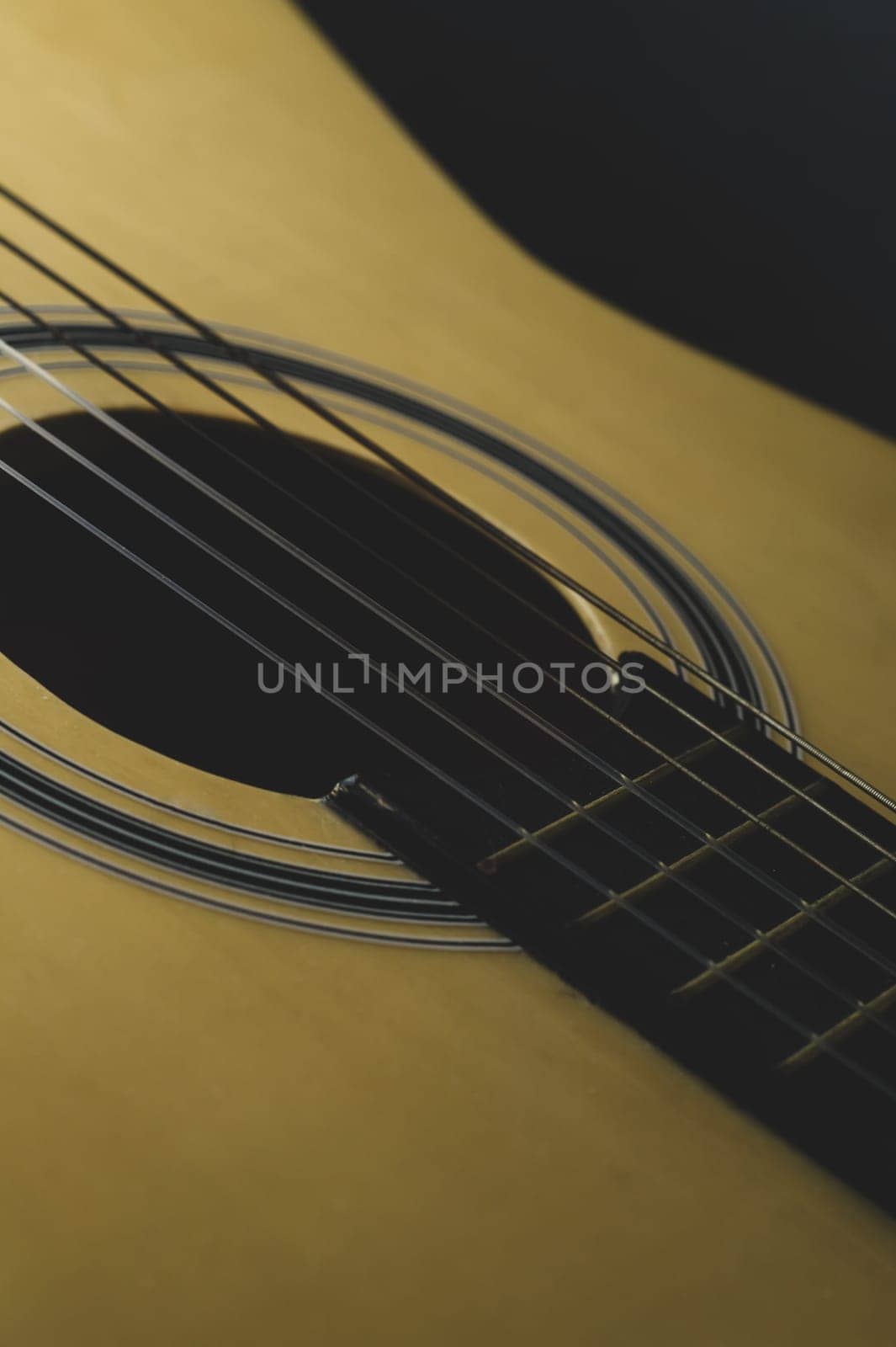 Acoustic guitar close up. musical instrument. strings on the guitar neck