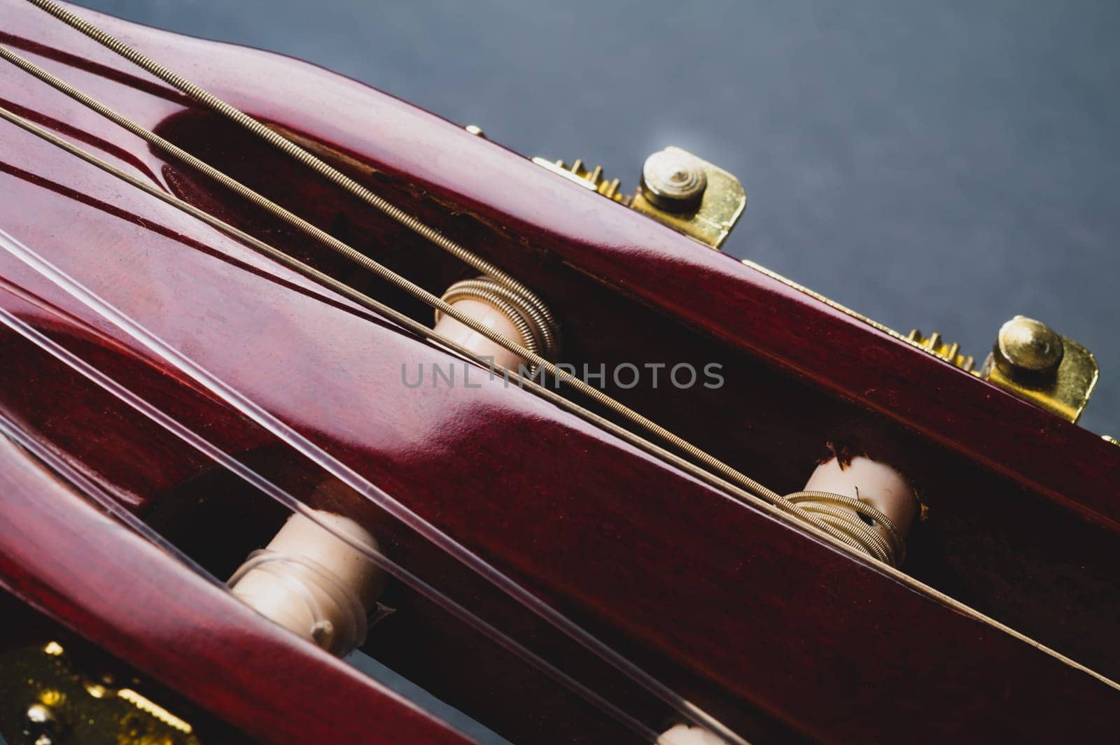 Guitar headstock close up. acoustic musical instrument