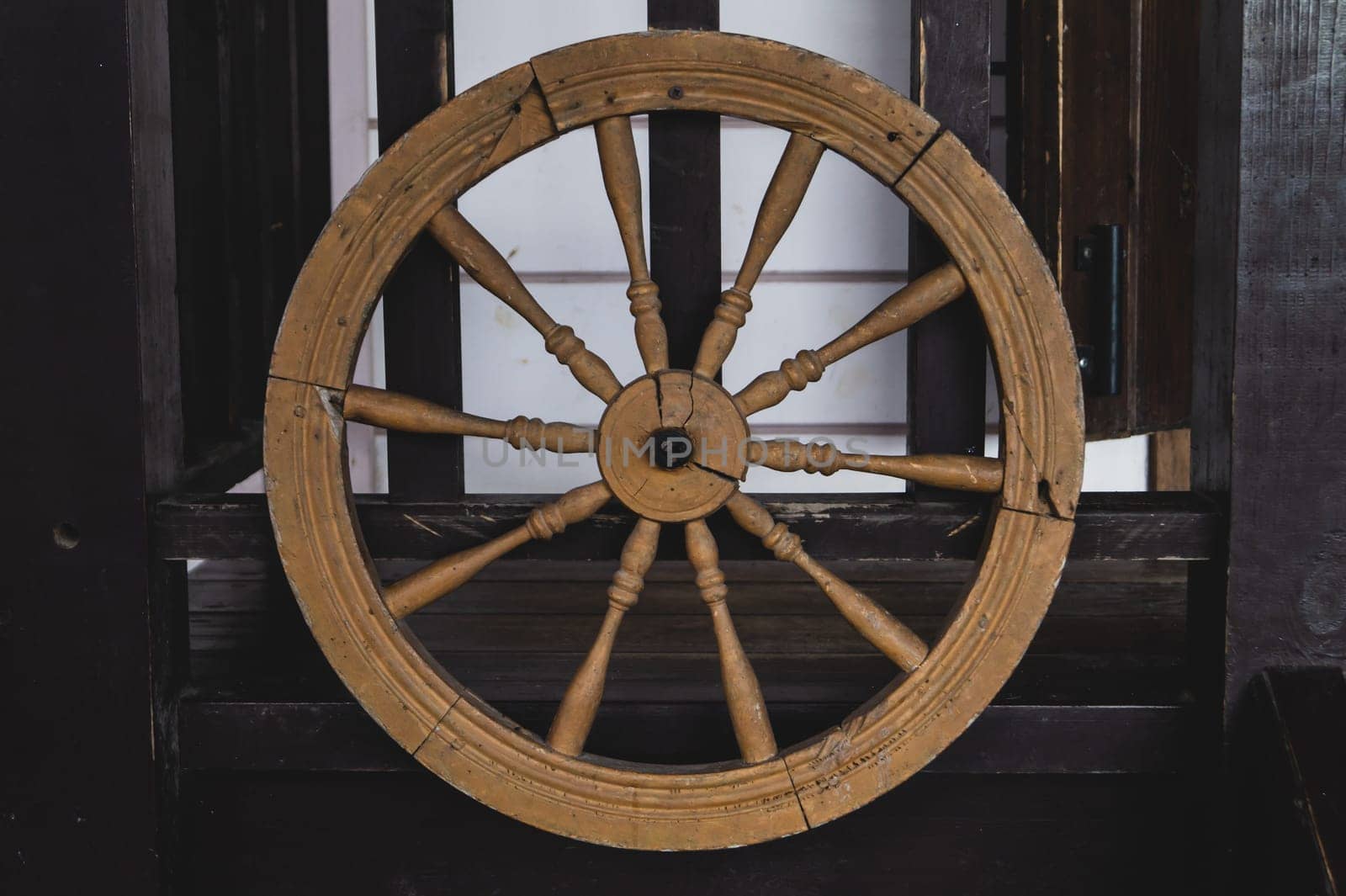 Old wooden wheel of wagon