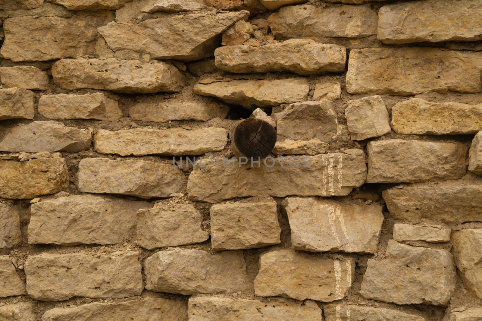 Rocky brick wall. stone wall background. abstract brown grunge texture. old masonry