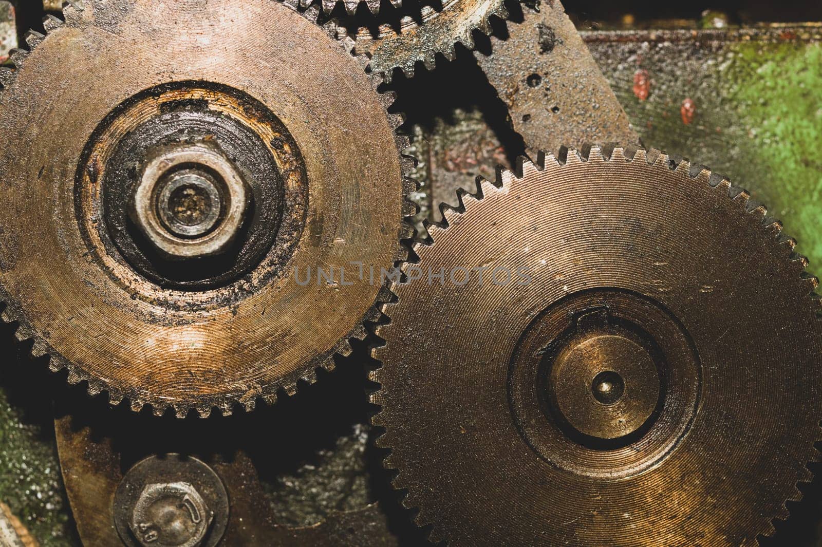 Gears of industrial machine. detail of mechanism. old cogwheels. mechanical parts of machinery