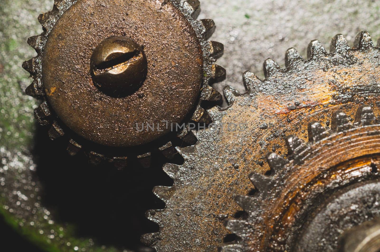 Gears of industrial machine. detail of mechanism. old cogwheels. mechanical parts of machinery