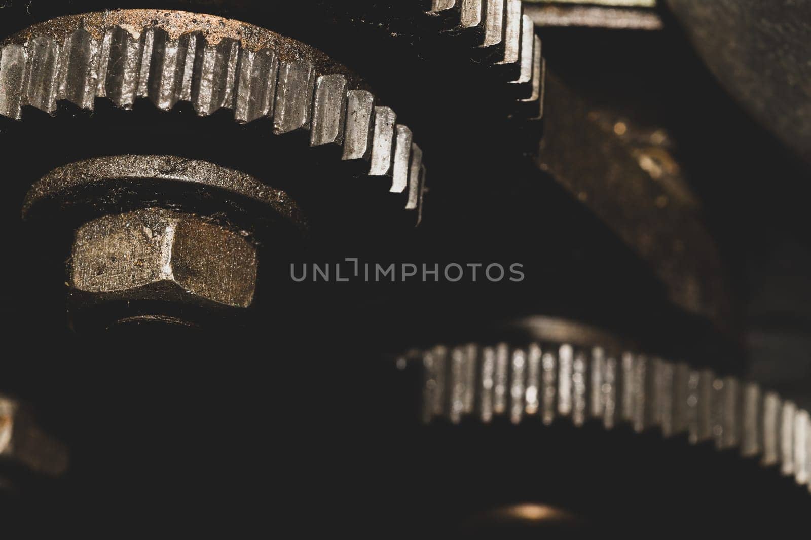 Gears of industrial machine. detail of mechanism. old cogwheels. mechanical parts of machinery