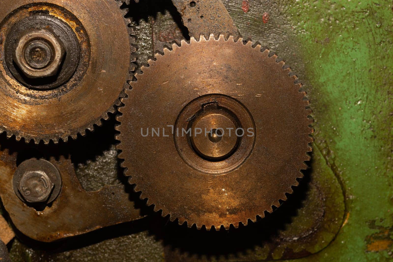 Gears of industrial machine. detail of mechanism. old cogwheels. mechanical parts of machinery