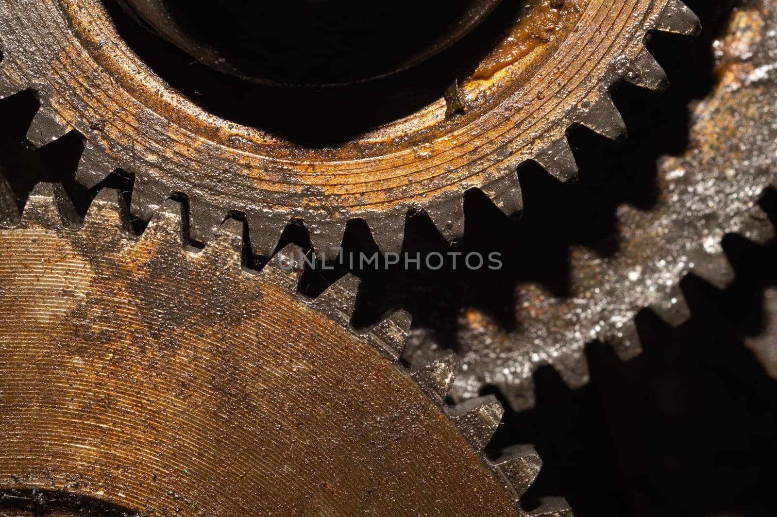 Gears of industrial machine. detail of mechanism. old cogwheels. mechanical parts of machinery