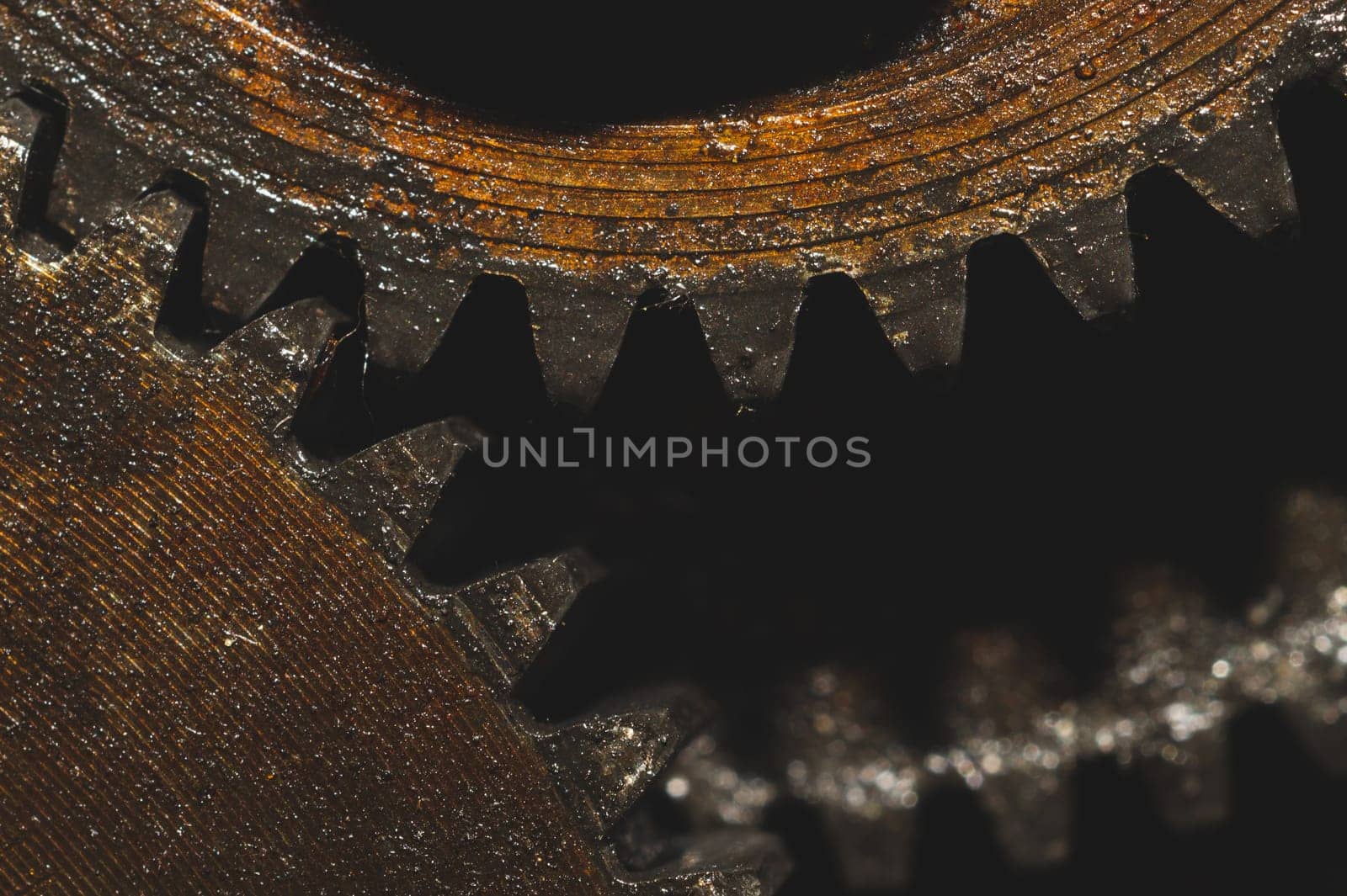 Gears of industrial machine. detail of mechanism. old cogwheels. mechanical parts of machinery