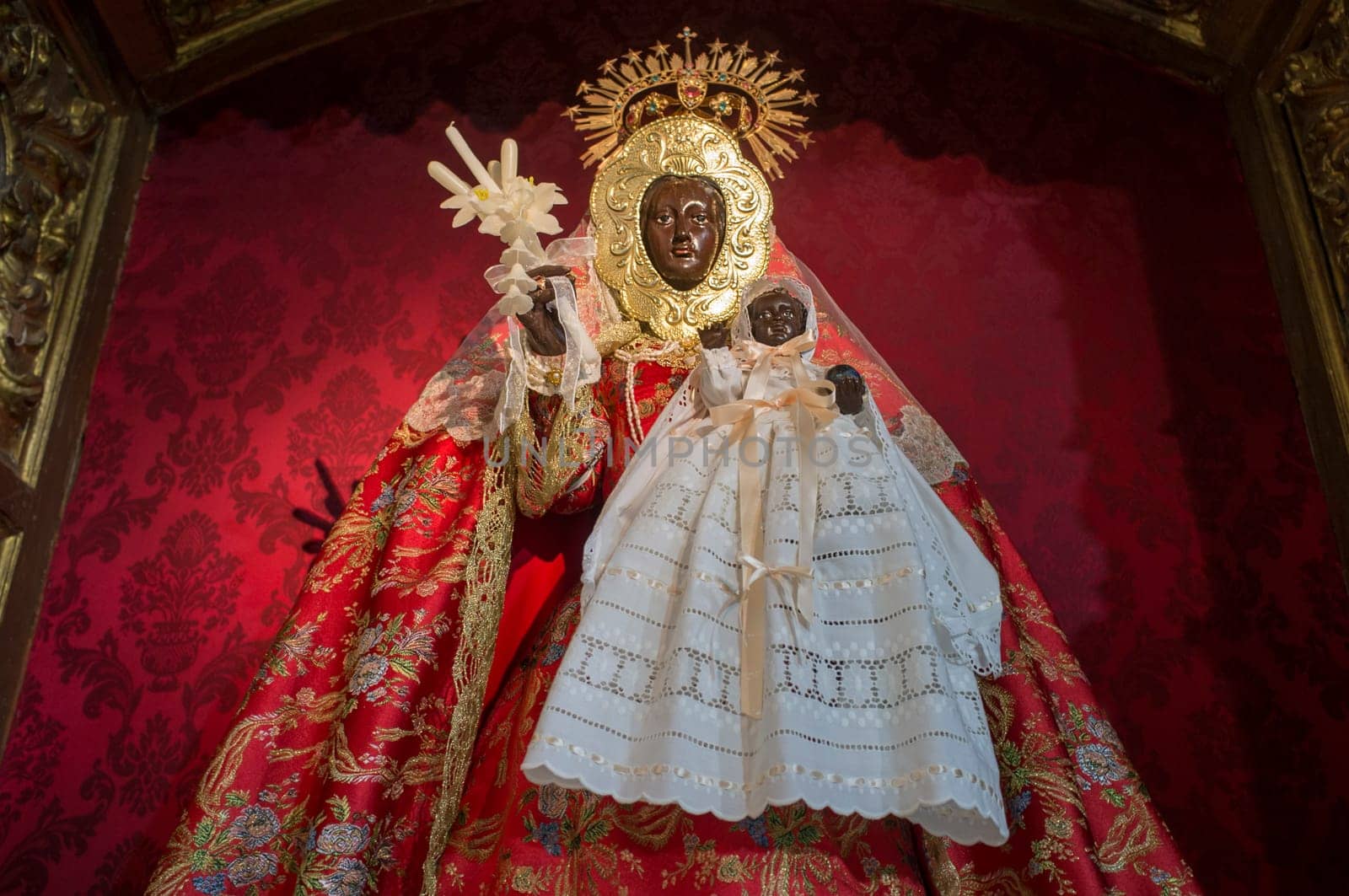 Caceres, Spain - Jan 14th, 2021: Our Lady of Guadalupe del Vaquero figure. Church of Santiago, Caceres, Extremadura, Spain
