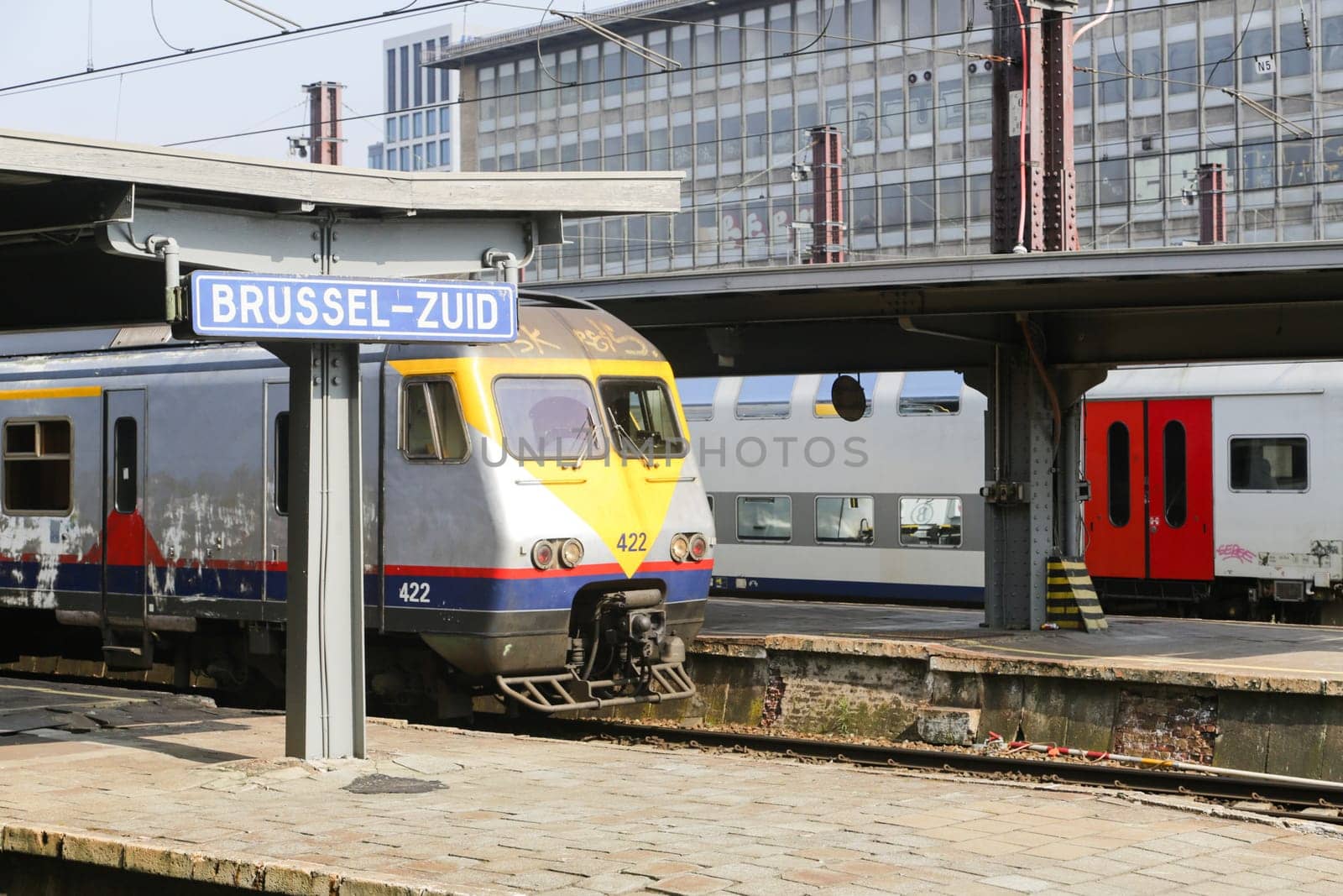 Rail tracks and trains in the Brussels South Railway Station