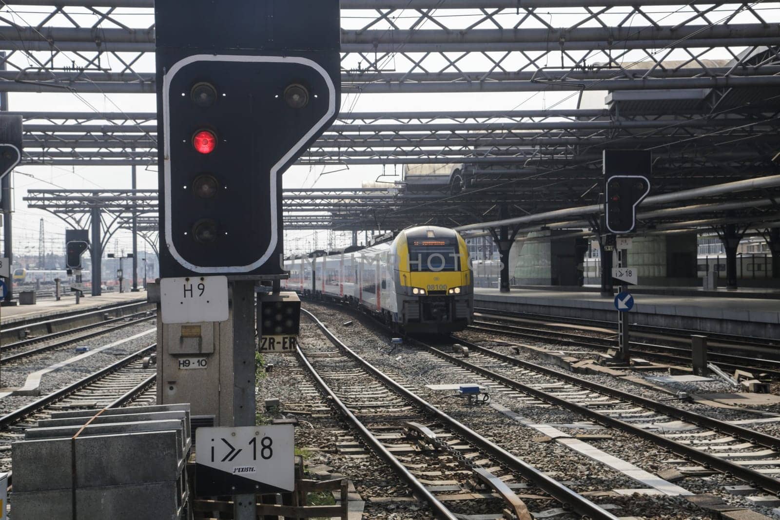 Rail tracks and trains in the Brussels South Railway Station