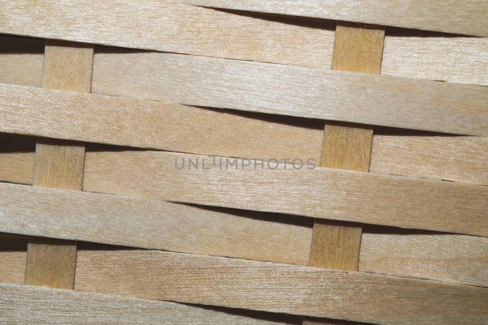 Wooden weaving background. wood wickerwork texture