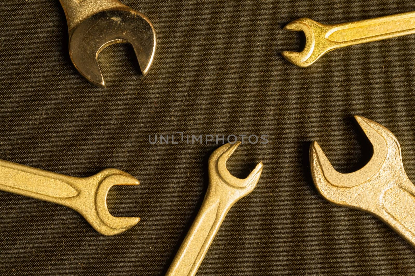 Different wrenches on a black background with copy space. working tool