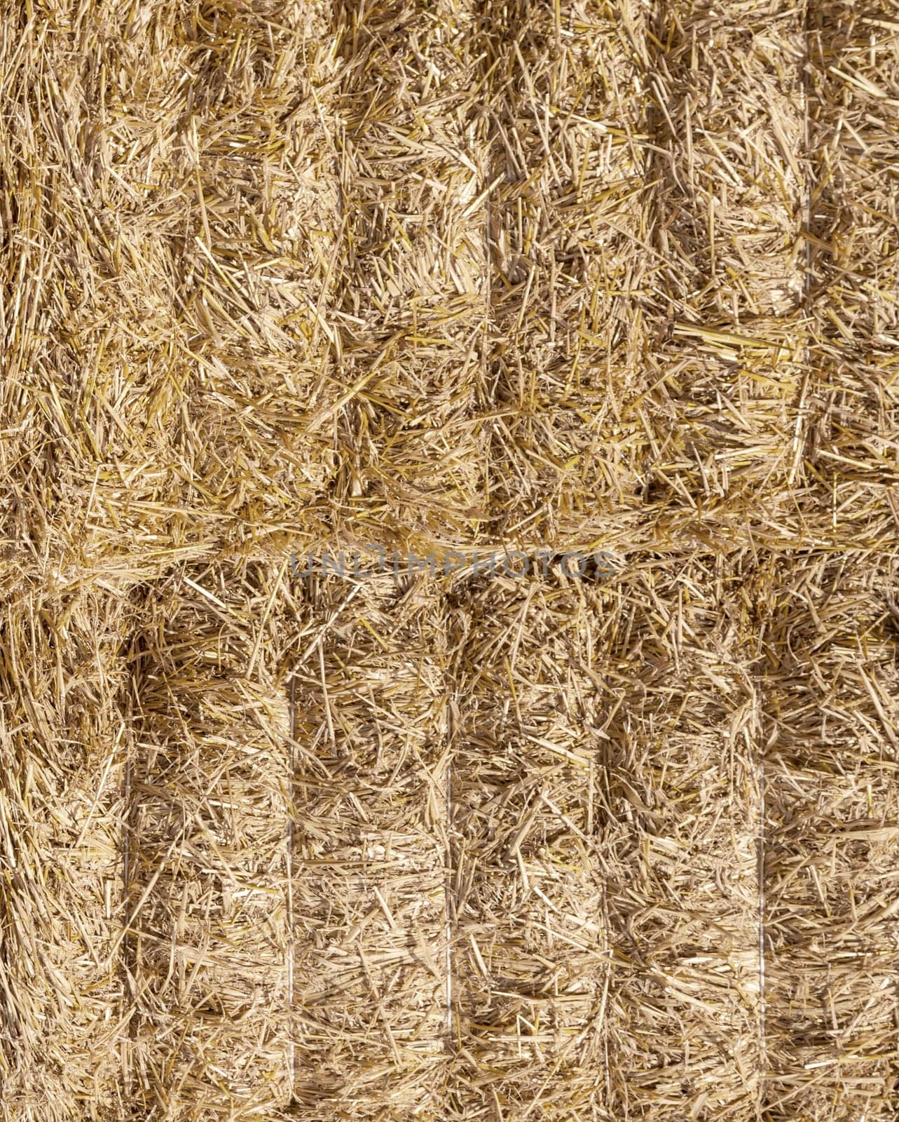 detil of stacked hay bales for background