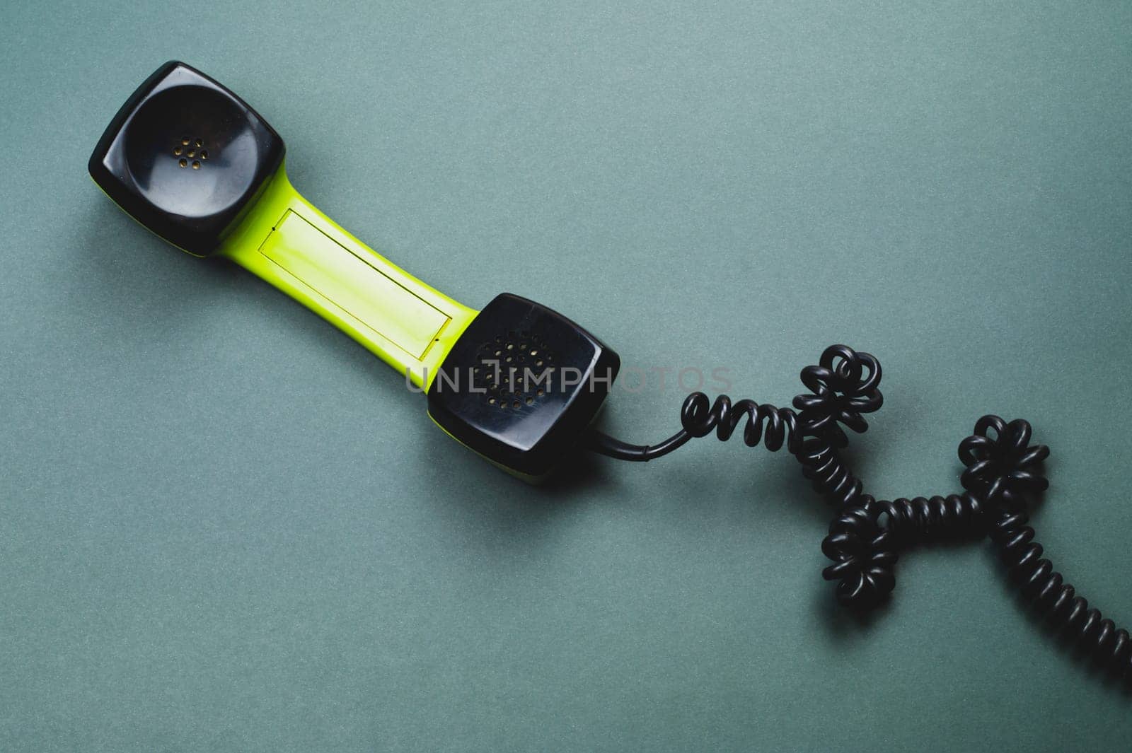 Telephone handset. phone receiver isolated on color background. old communication technology. copy space