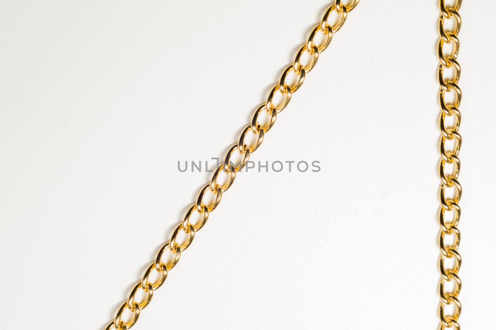 Golden chain isolated on white background