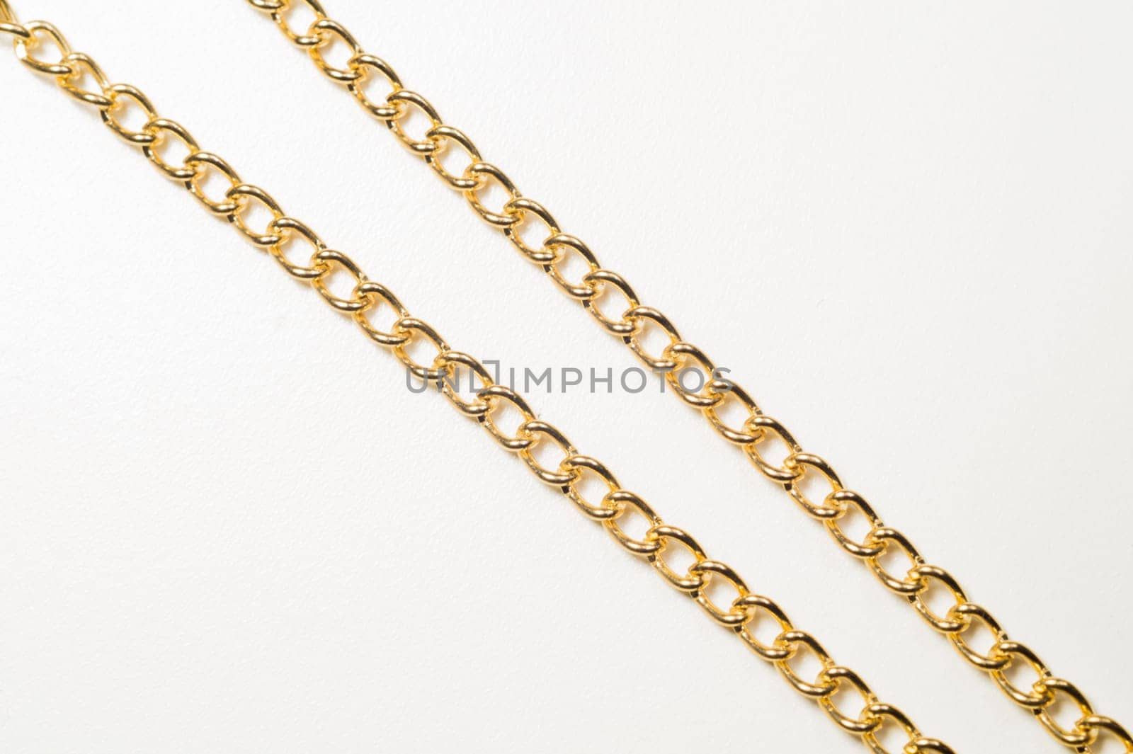 Golden chain isolated on white background