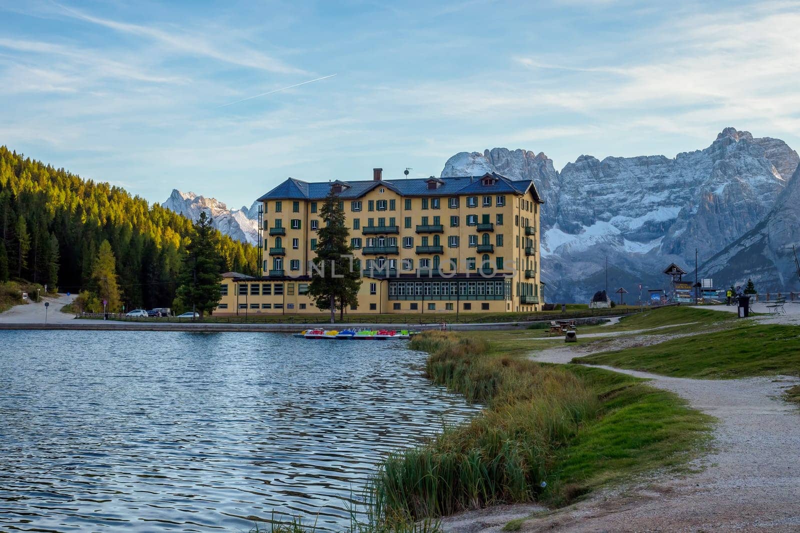 Misurina Lake and View on the majestic Dolomites Alp Mountains, National Park Tre Cime di Lavaredo, Dolomiti Alps, South Tyrol, Italy