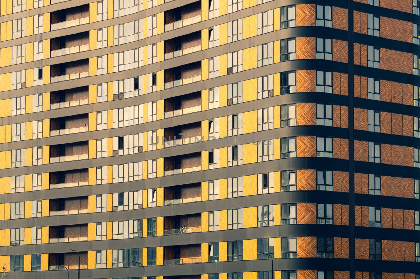 Modern building wall. detail of new constructed colorful building. modern residential construction