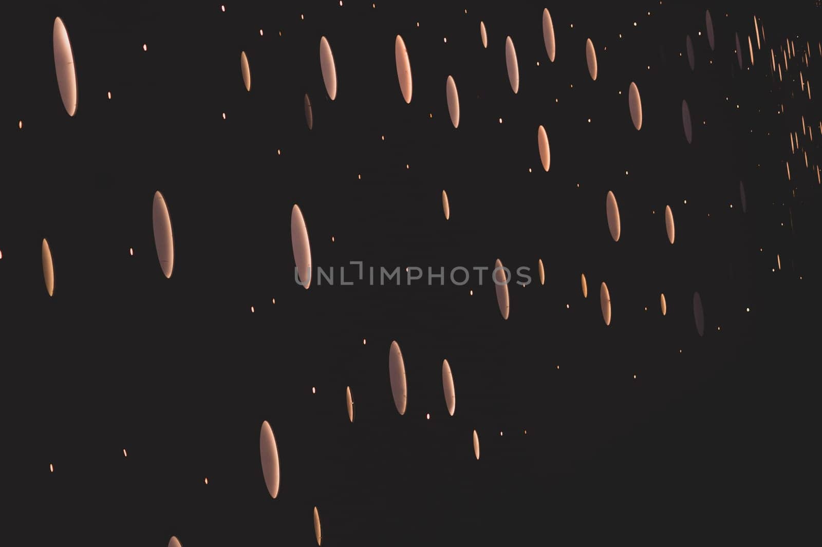 Sparkling lights on a black background. abstract backdrop with blinking lights