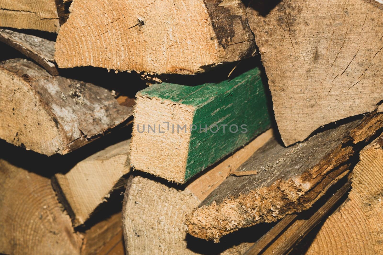 Stacks of firewood. preparation of firewood for the winter. pile of firewood