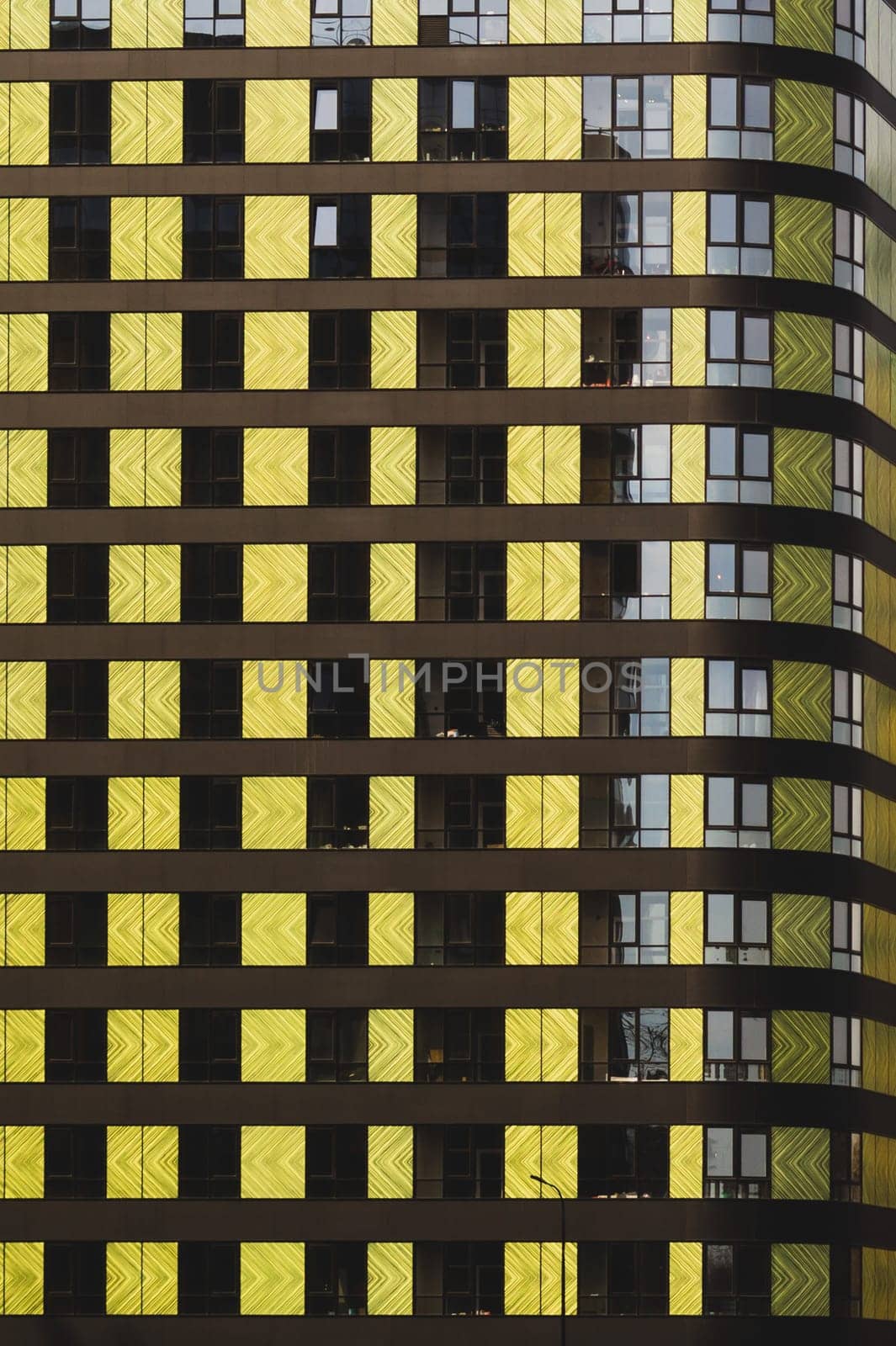 Modern building wall. detail of new constructed colorful building. modern residential construction