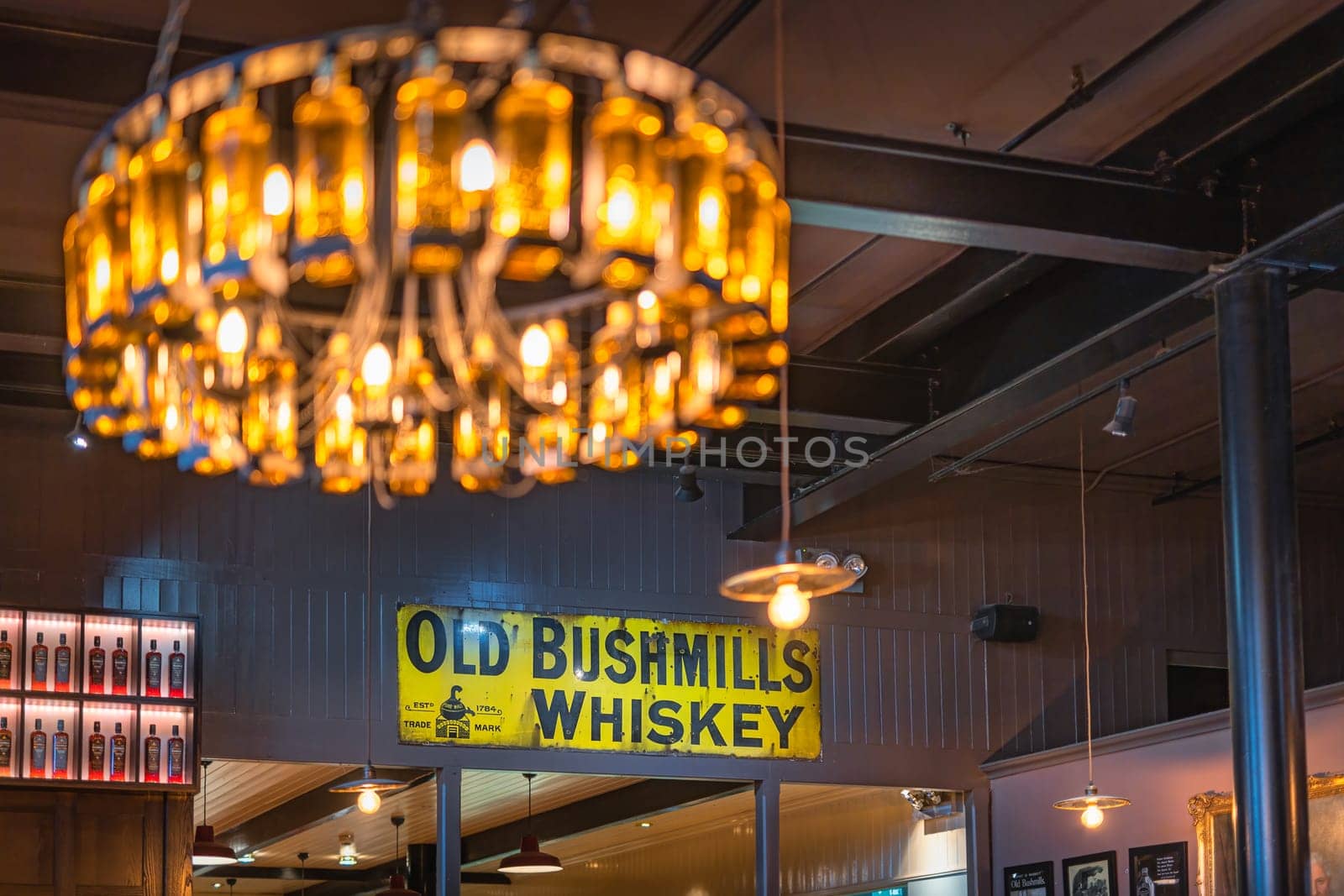 Bushmills, Northern Ireland, Aug 2019 Old Bushmills Whiskey sign in distillery visitor centre, bar and shop