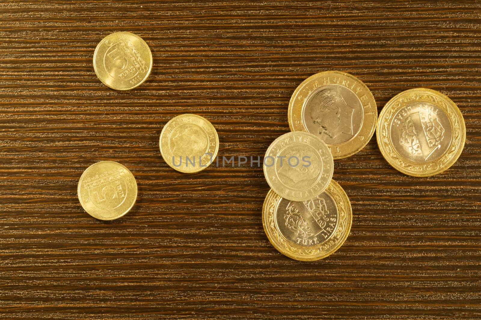 Turkish coins on a dark wooden background. lira from Turkey close up
