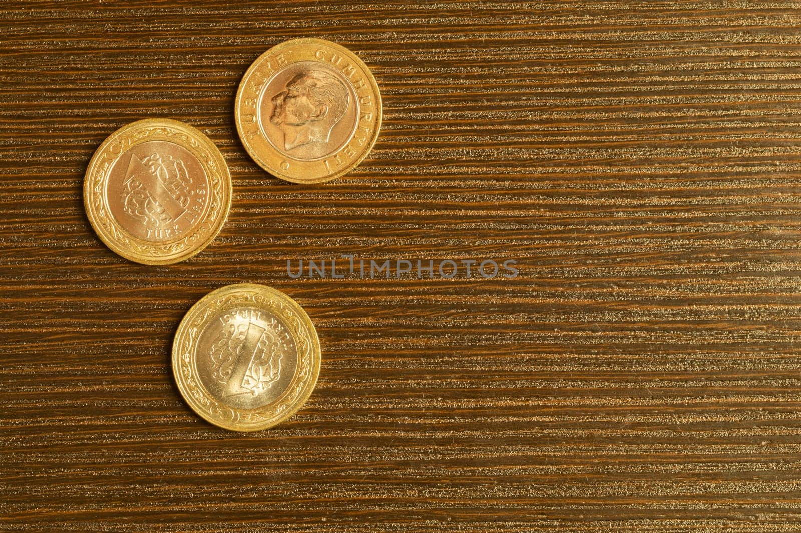 Turkish coins on a dark wooden background. lira from Turkey close up