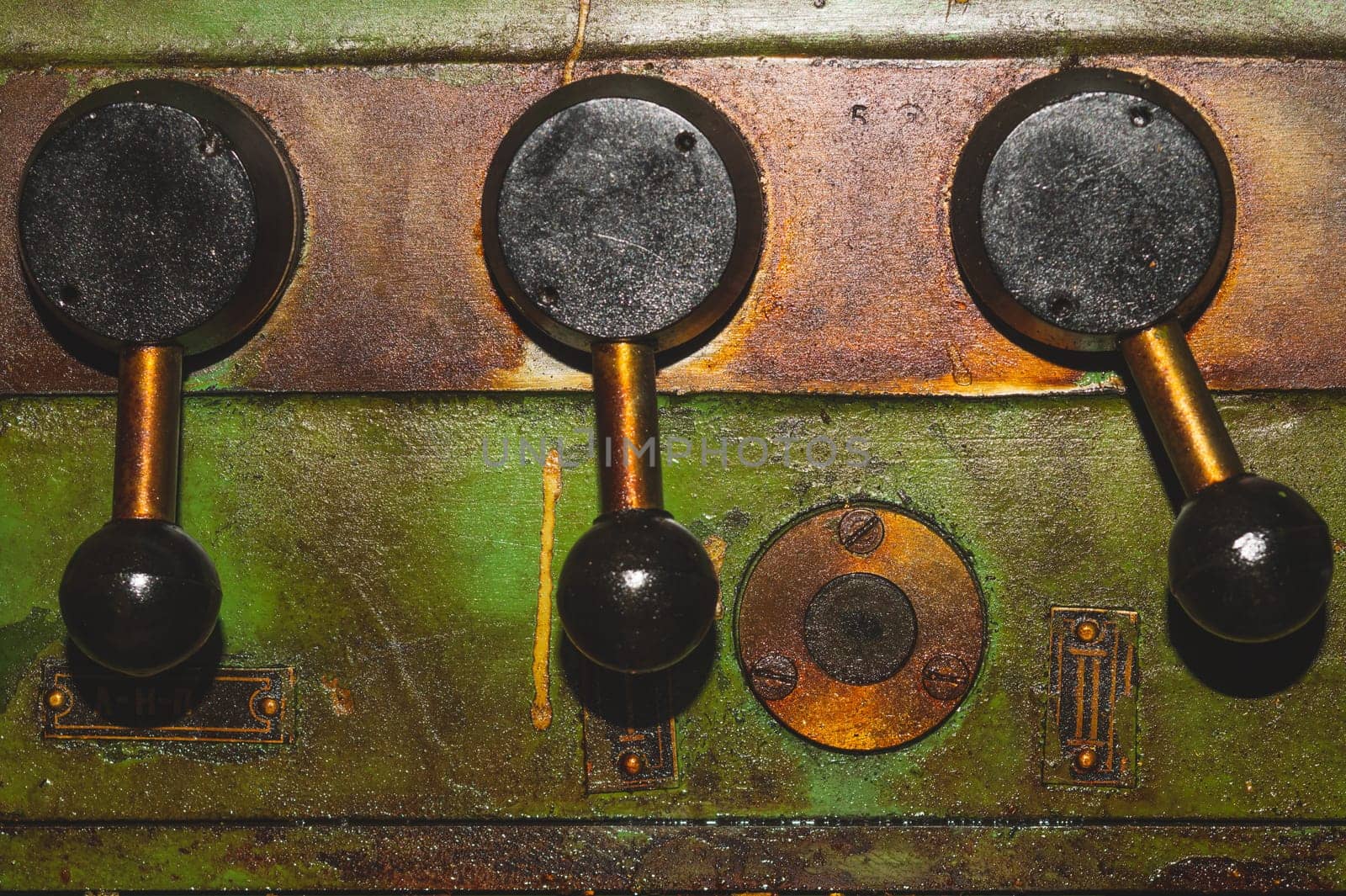 Old lathe. detail of rusty machine. metal mechanism. vintage metalworking machine close up. abstract industrial background