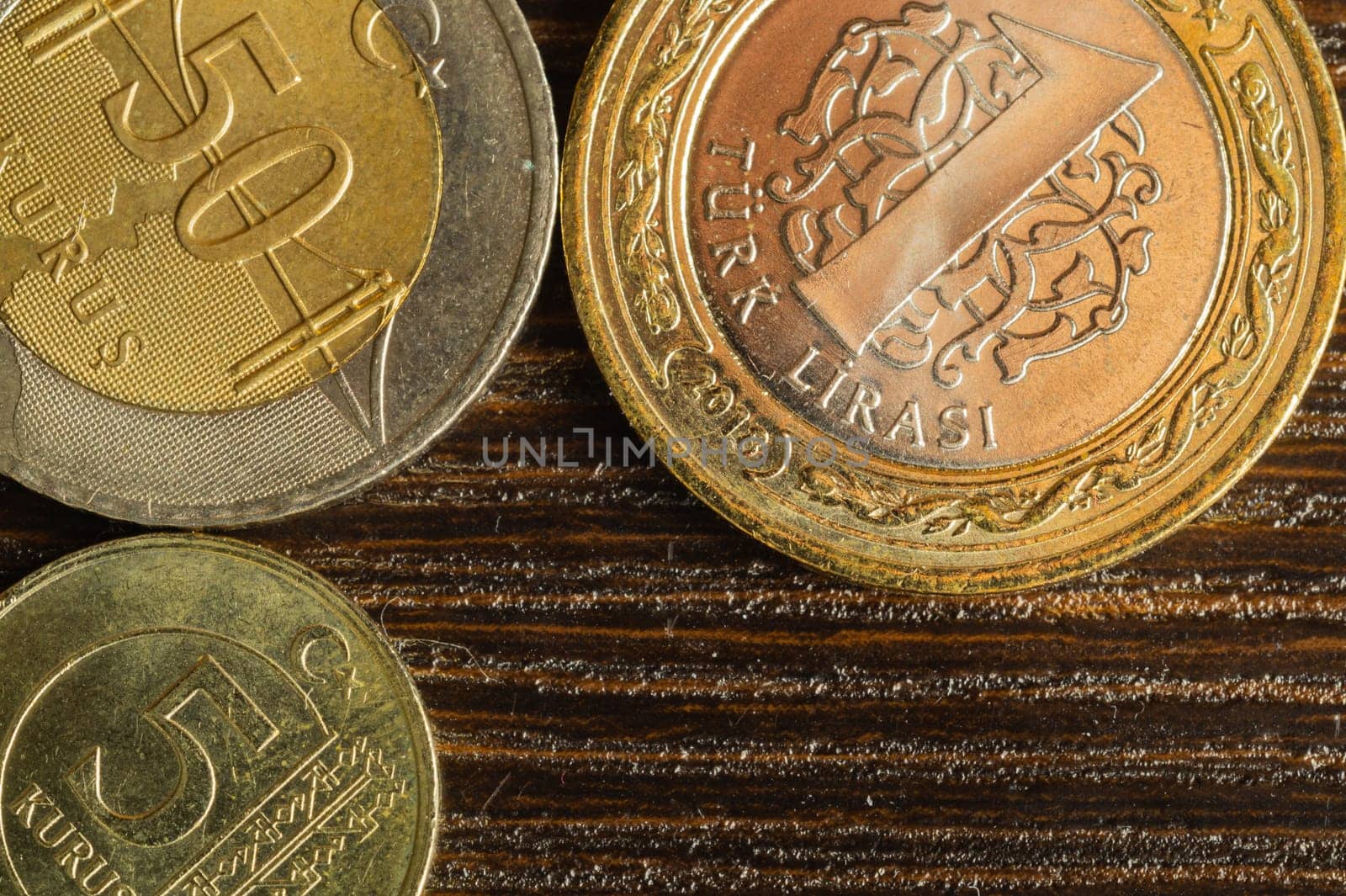 Turkish coins on a dark wooden background. lira from Turkey close up