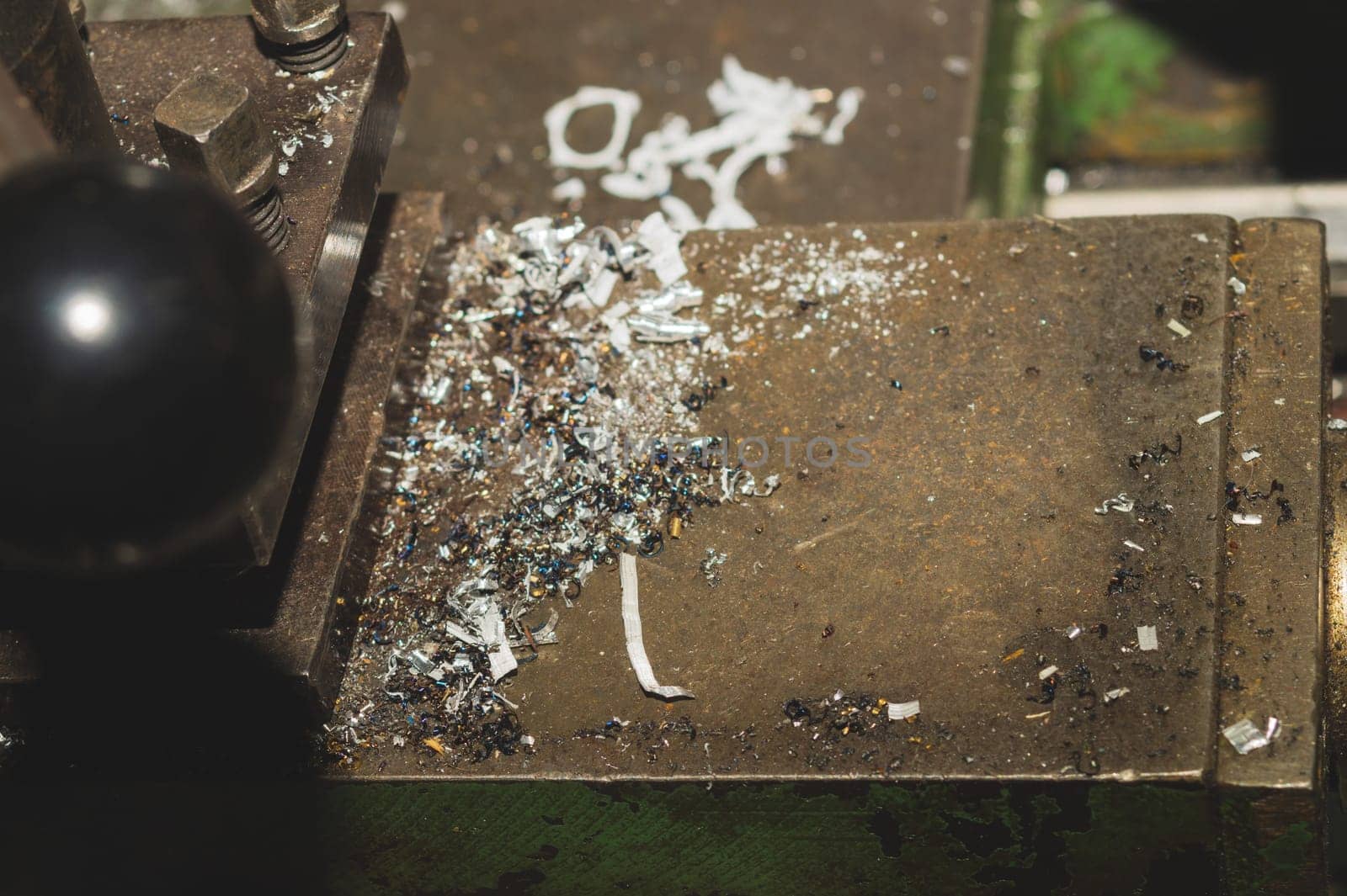 Old lathe. detail of rusty machine. vintage metalworking process close up. abstract industrial background