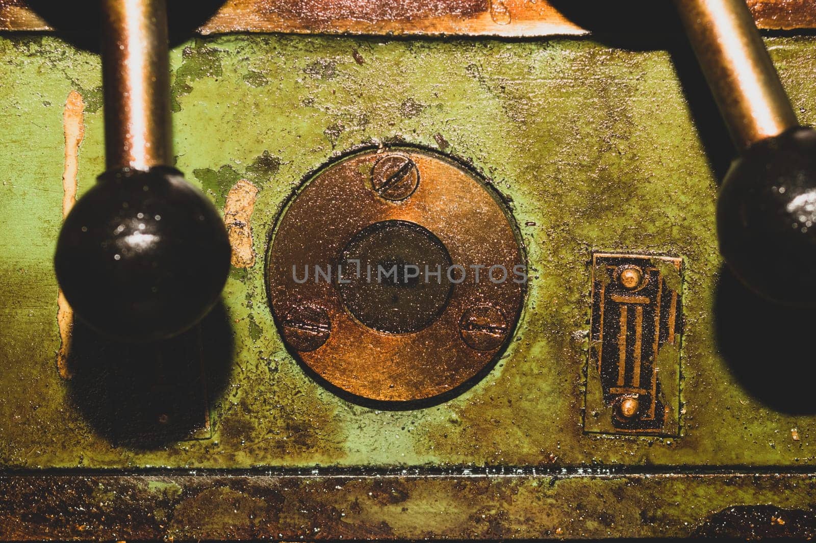Old lathe. detail of rusty machine. metal mechanism. vintage metalworking machine close up. abstract industrial background