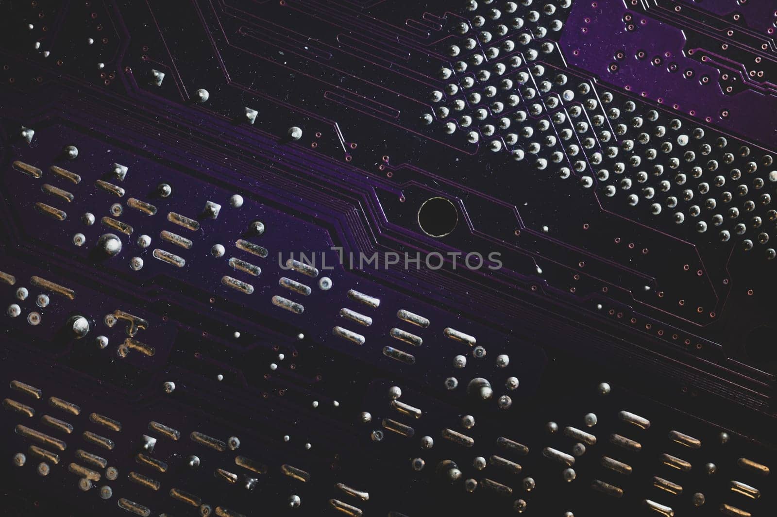 Processor pins macro. computer motherboard close up. cpu pins on a circuit board. micro elements of computer central processor unit. modern technologies abstract background