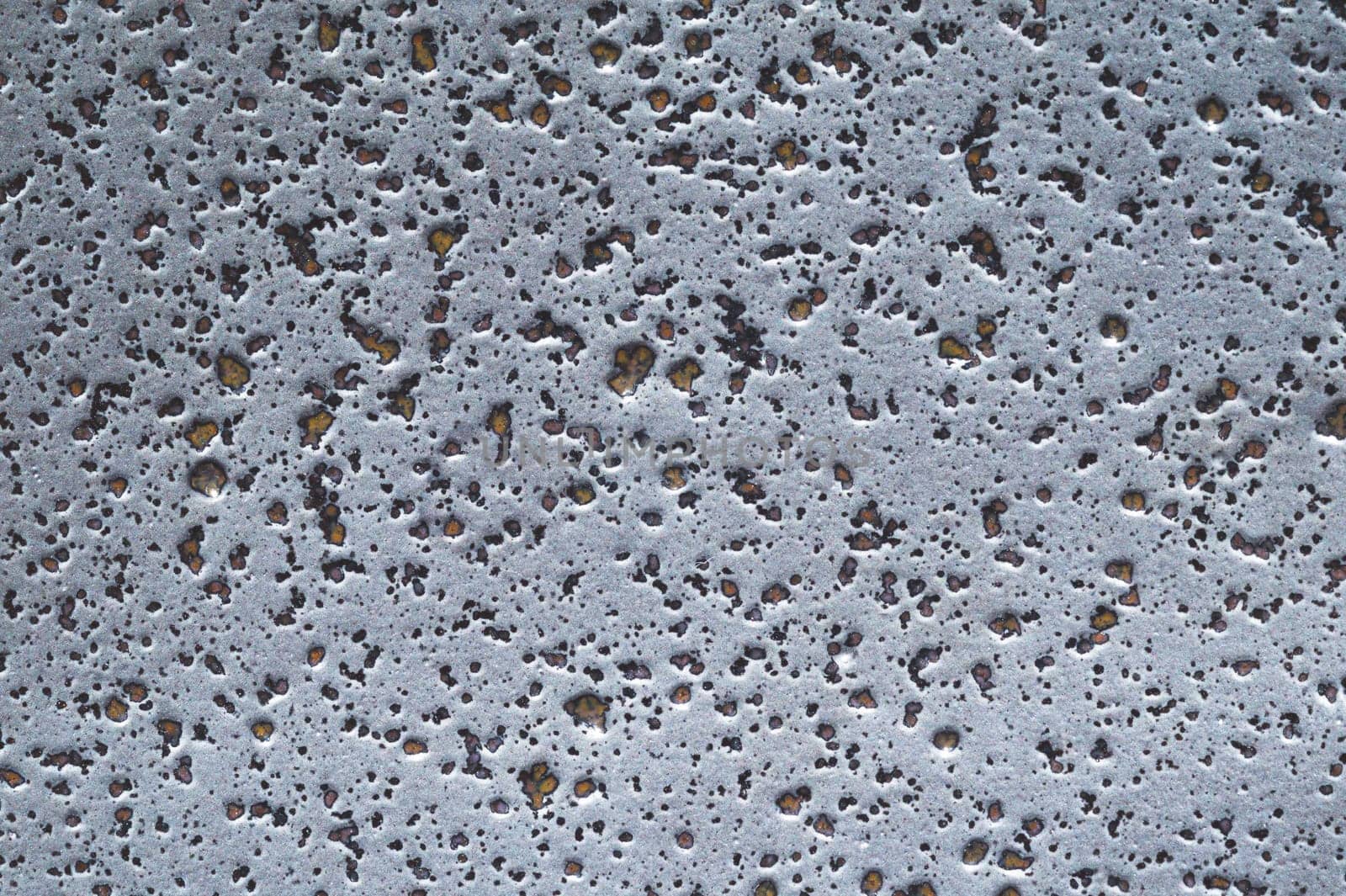 Grunge texture. gray wall close up. rough background. stone surface with spots